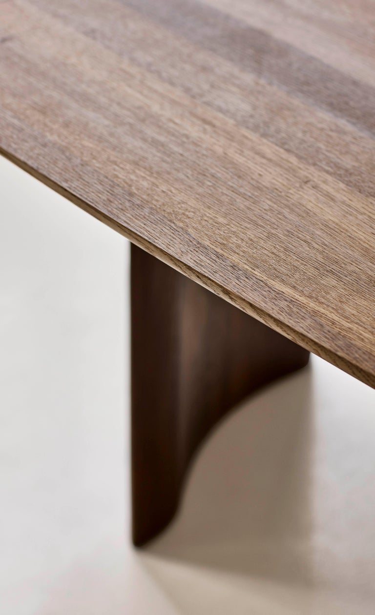 https://a.1stdibscdn.com/contemporary-rectangular-dining-table-tangent-by-dk3-oiled-white-oak-240-cm-for-sale-picture-16/f_31233/f_458106321752143114869/Tangent_Table_rect_smoked_oak_close_up_7_low_master.jpg?width=768