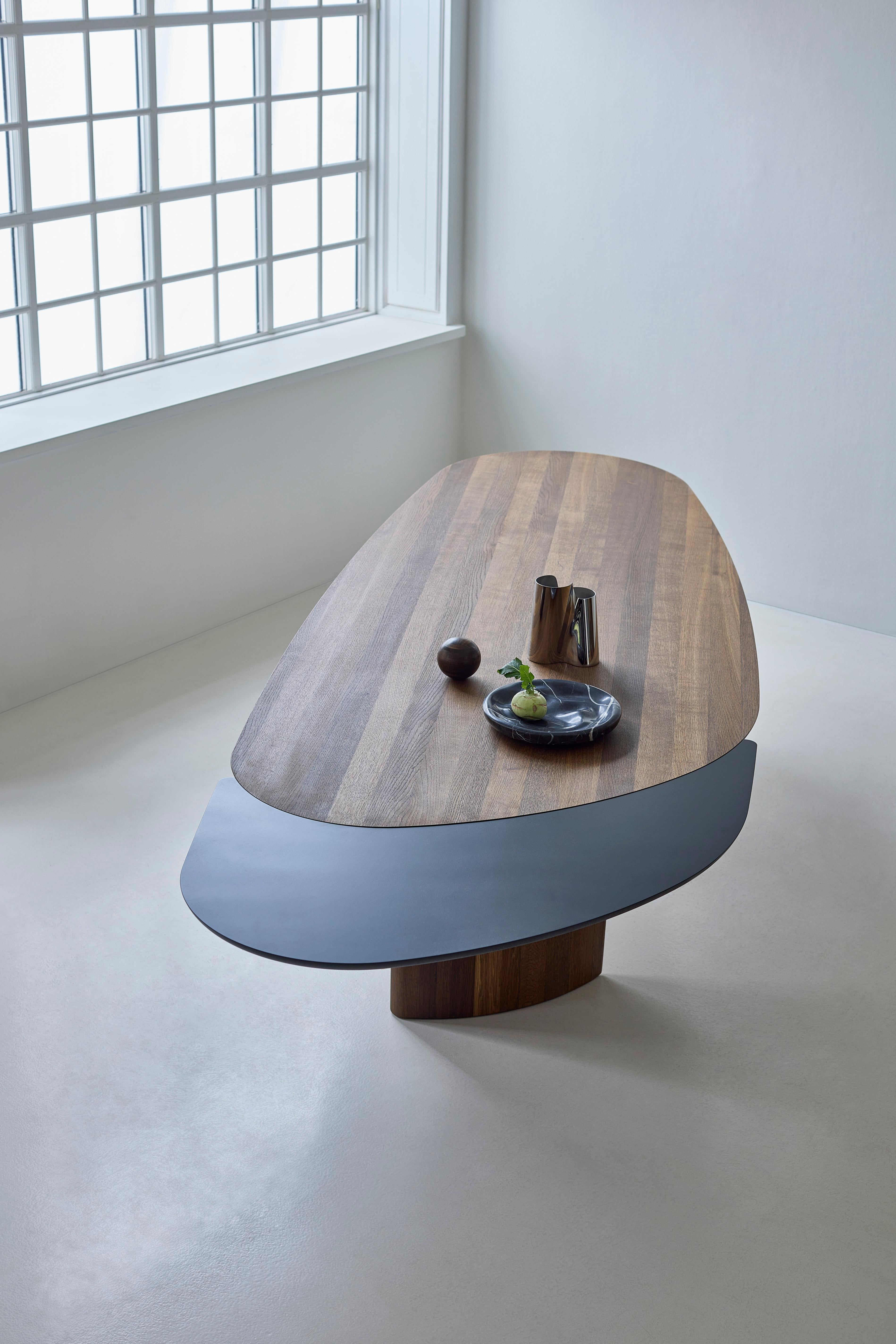 https://a.1stdibscdn.com/contemporary-rectangular-dining-table-tangent-by-dk3-lacquered-oak-240-cm-for-sale-picture-18/f_31233/f_457970821752067777261/Tangent_Table_rect_smoked_oak_w_extension_black_mdf_1_low_master.jpg