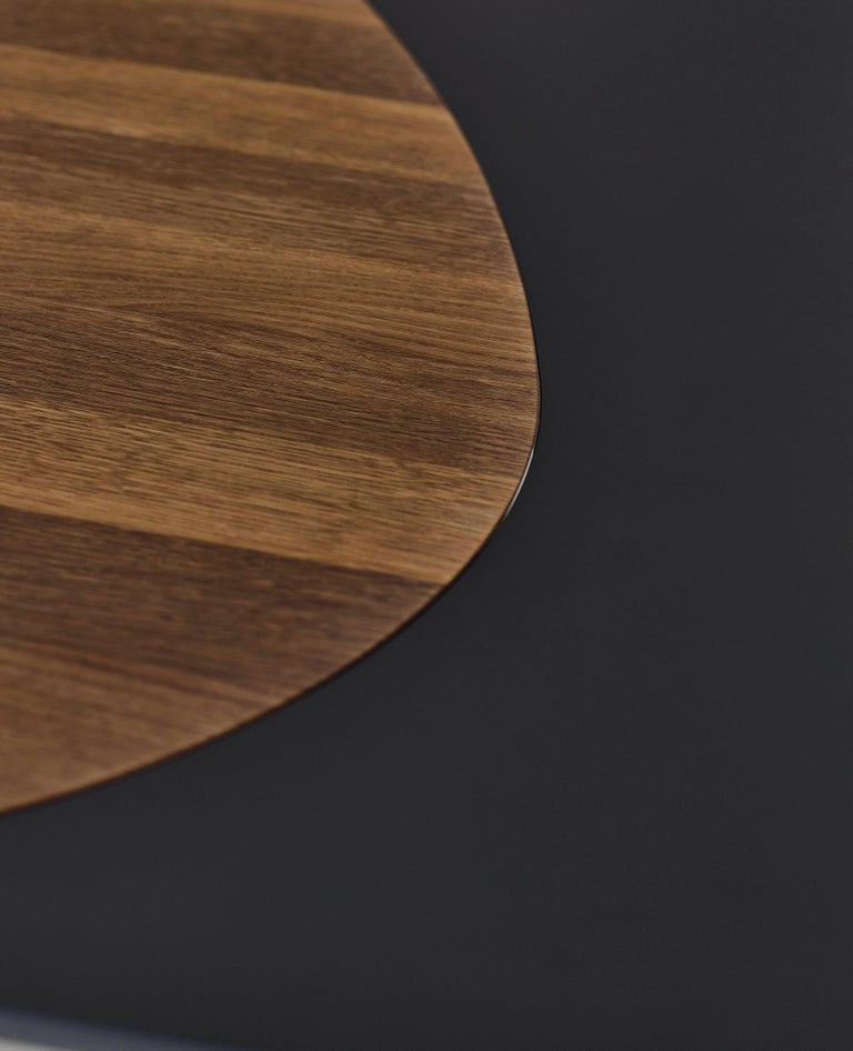 https://a.1stdibscdn.com/contemporary-rectangular-dining-table-tangent-by-dk3-smoked-oak-240-cm-for-sale-picture-19/f_31233/f_457629221751895315583/Tangent_Table_rect_smoked_oak_w_extension_black_mdf_closeup_low_master.jpg?width=768