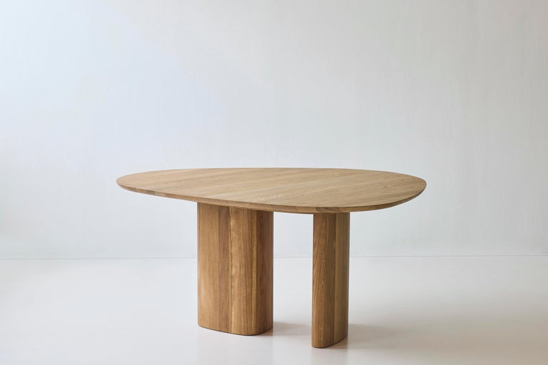 https://a.1stdibscdn.com/contemporary-round-dining-table-tangent-by-anne-boysen-x-dk3-lacquered-walnut-for-sale-picture-18/f_31233/f_456036121750852354501/Tanget_Table_Round_oak_oil_12_low_master.jpg?width=768