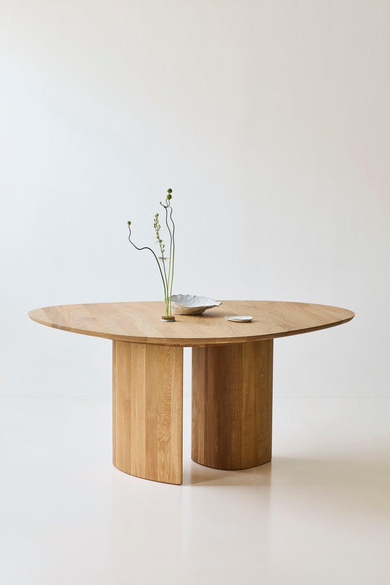 https://a.1stdibscdn.com/contemporary-round-dining-table-tangent-by-anne-boysen-x-dk3-lacquered-walnut-for-sale-picture-14/f_31233/f_456036121750852353175/Tanget_Table_Round_oak_oil_2_low_master.jpg?width=768