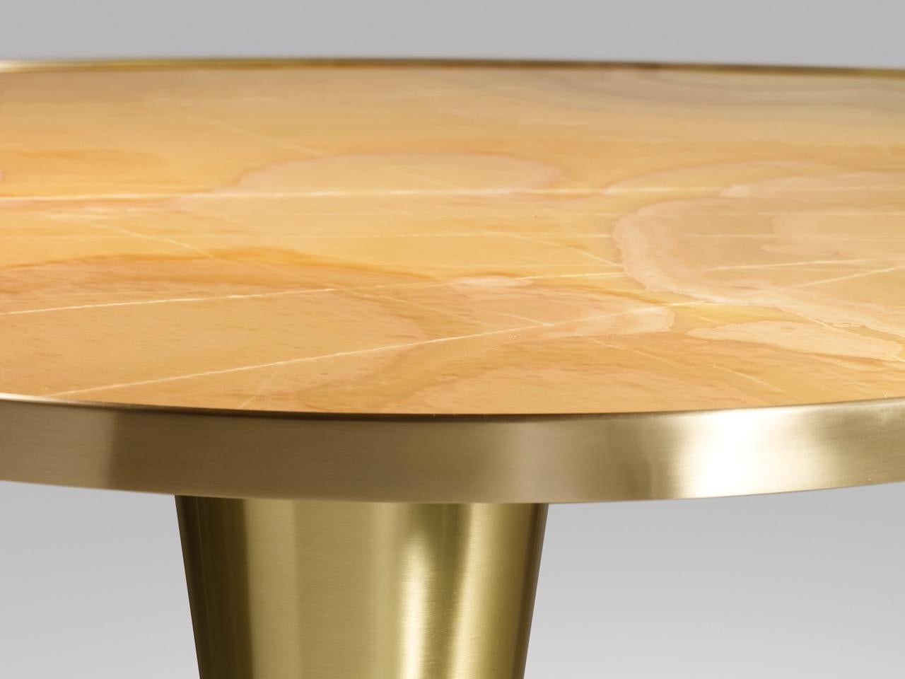 https://a.1stdibscdn.com/onyx-and-brass-satellite-dining-table-by-atelier-terrai-for-sale-picture-3/f_12192/f_444601221744312831266/Tavolo2_master.jpeg