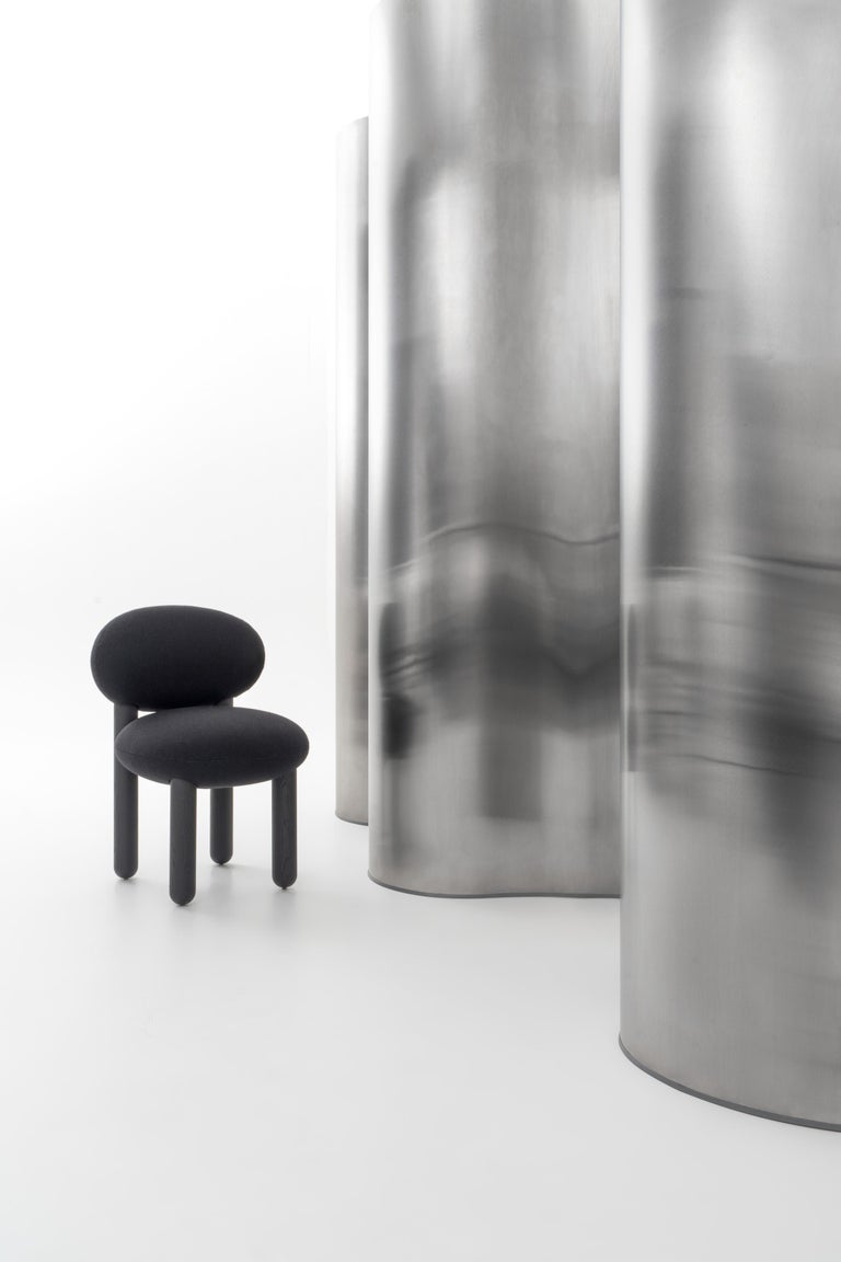 https://a.1stdibscdn.com/modern-dining-chair-flock-cs2-with-wooden-legs-in-various-fabrics-by-noom-for-sale-picture-15/f_42321/f_379525721705336970201/The_Flock_chairs_by_NOOM_on_steel_background_12__master.jpg?width=768