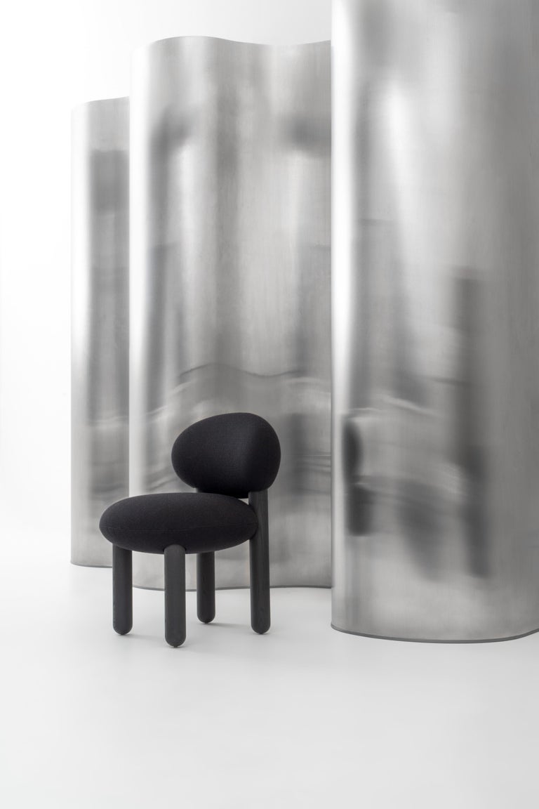 https://a.1stdibscdn.com/modern-dining-chair-flock-cs2-in-kvadrat-zero-fabric-by-noom-for-sale-picture-8/f_42321/f_371375421700237686619/The_Flock_chairs_by_NOOM_on_steel_background_13__master.jpg?width=768