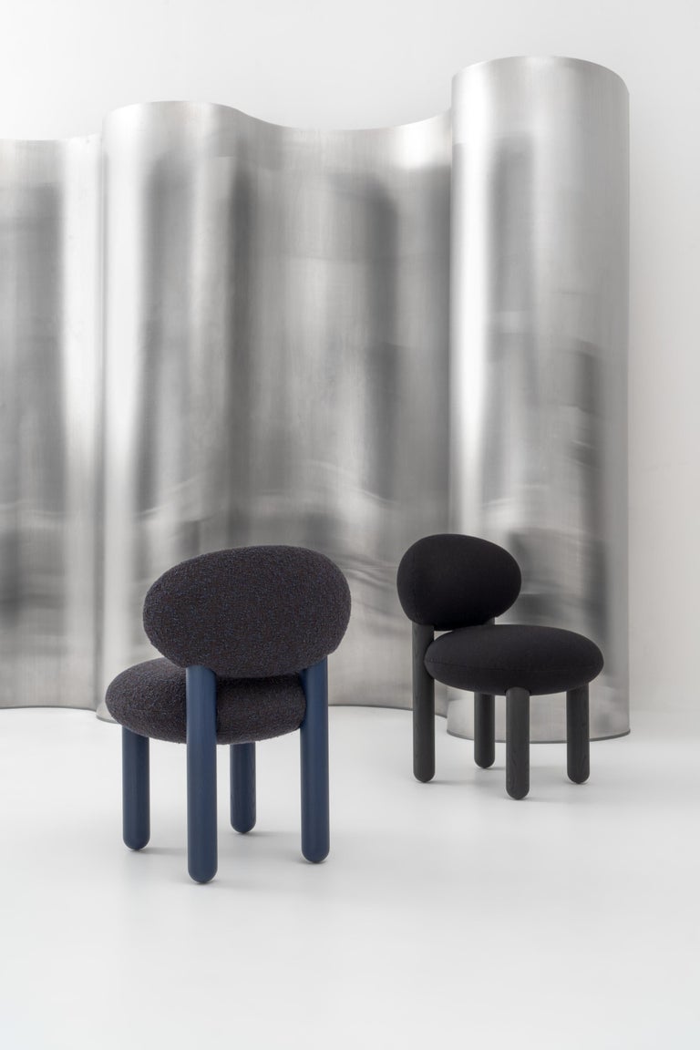https://a.1stdibscdn.com/contemporary-dining-chair-flock-cs2-by-noom-yellow-brown-legs-for-sale-picture-13/32076752/f_391268921712214784897/The_Flock_chairs_by_NOOM_on_steel_background_9_master_master.jpg?width=768