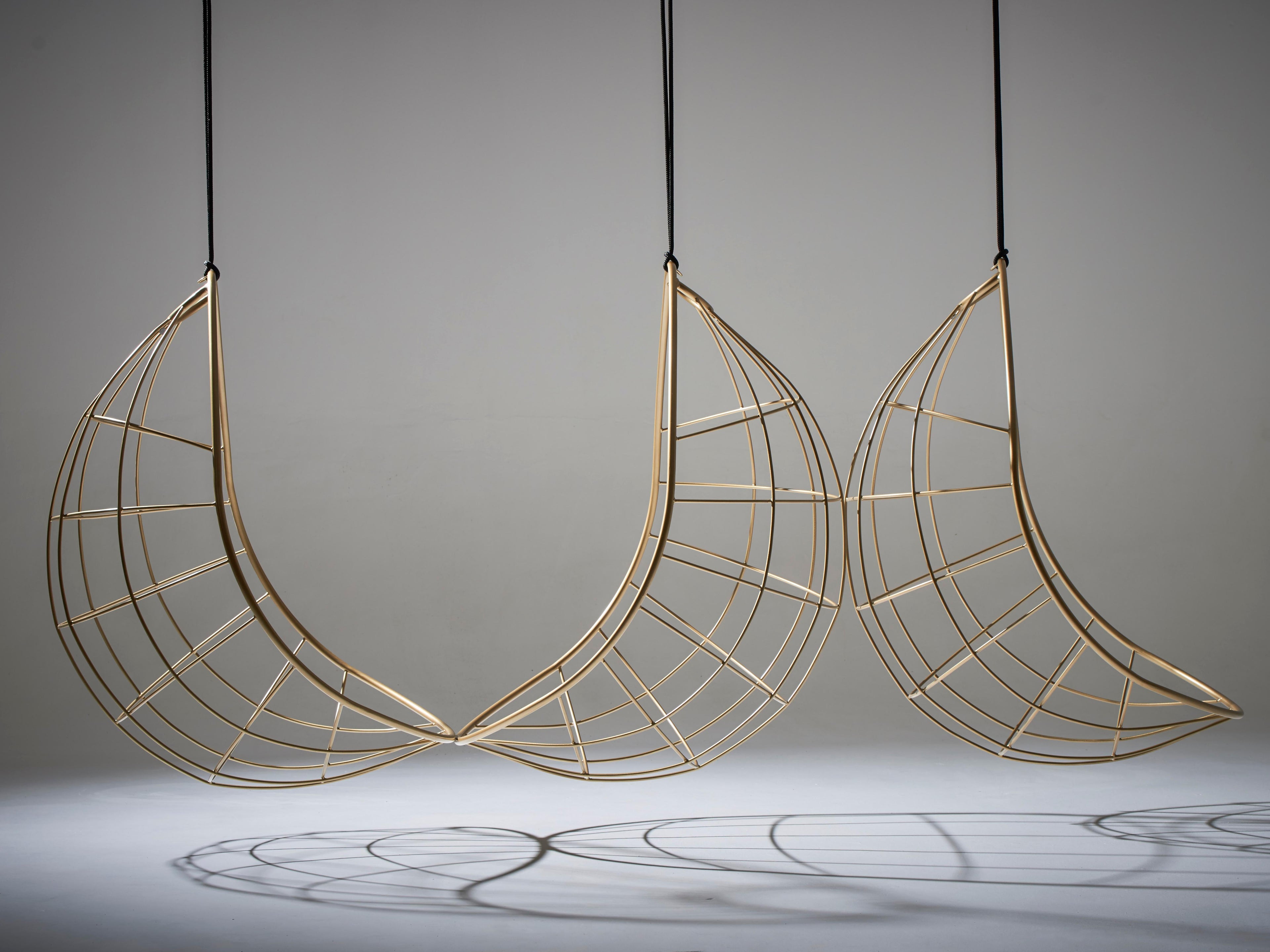 https://a.1stdibscdn.com/nest-egg-hanging-swing-chair-steel-modern-in-outdoor-21st-century-black-twig-for-sale-picture-19/f_32773/f_95535731610227423546/The_Nest_Egg_Gold_Bronze_Hanging_Swing_Chair_detail_11_master.jpg