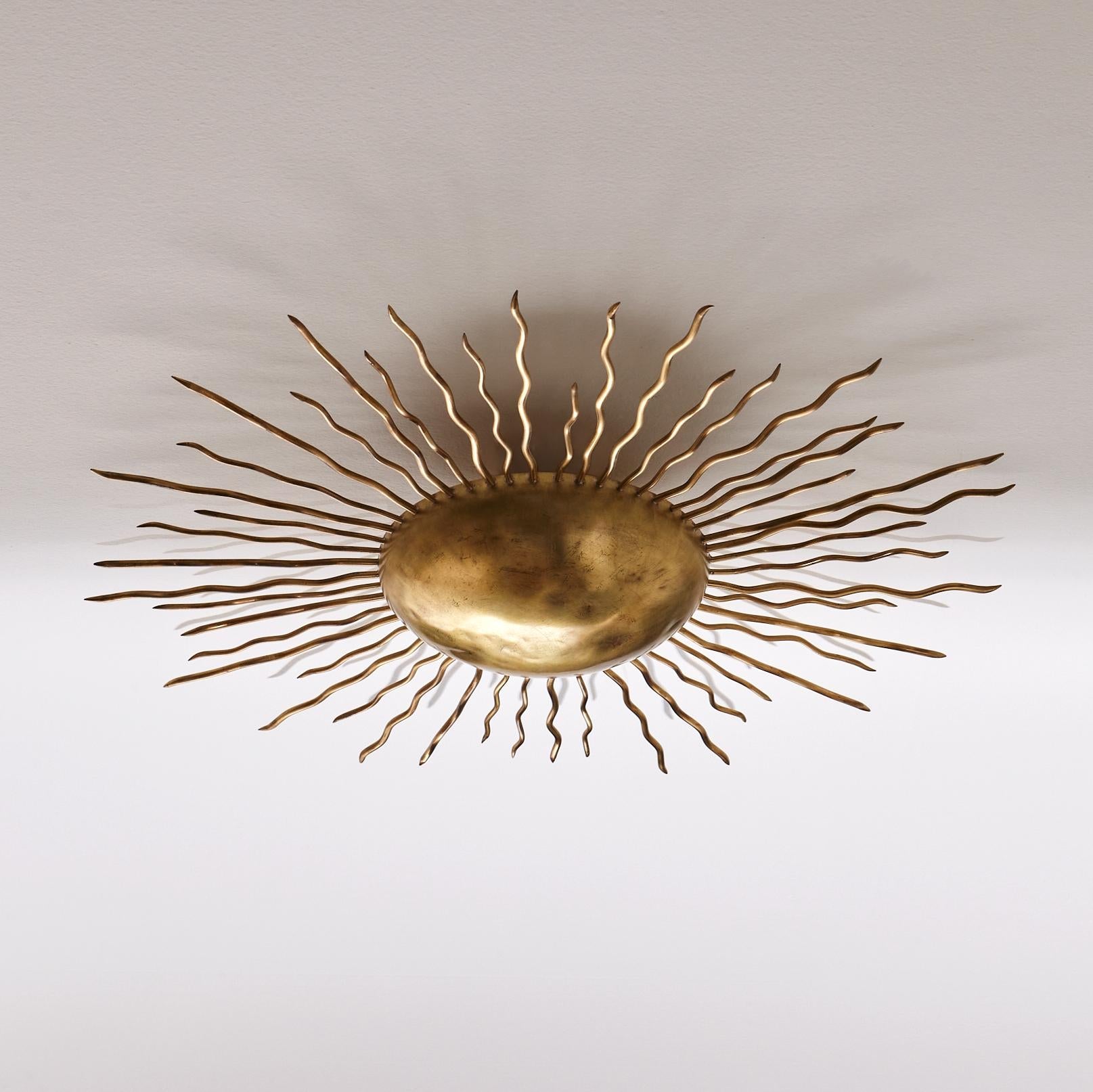 https://a.1stdibscdn.com/sunburst-ceiling-light-by-sister-by-studio-ashby-for-sale-picture-6/f_87162/f_353207521696349609589/The_Sunburst_Light_Sister_By_Studio_Ashby_1_master.jpg