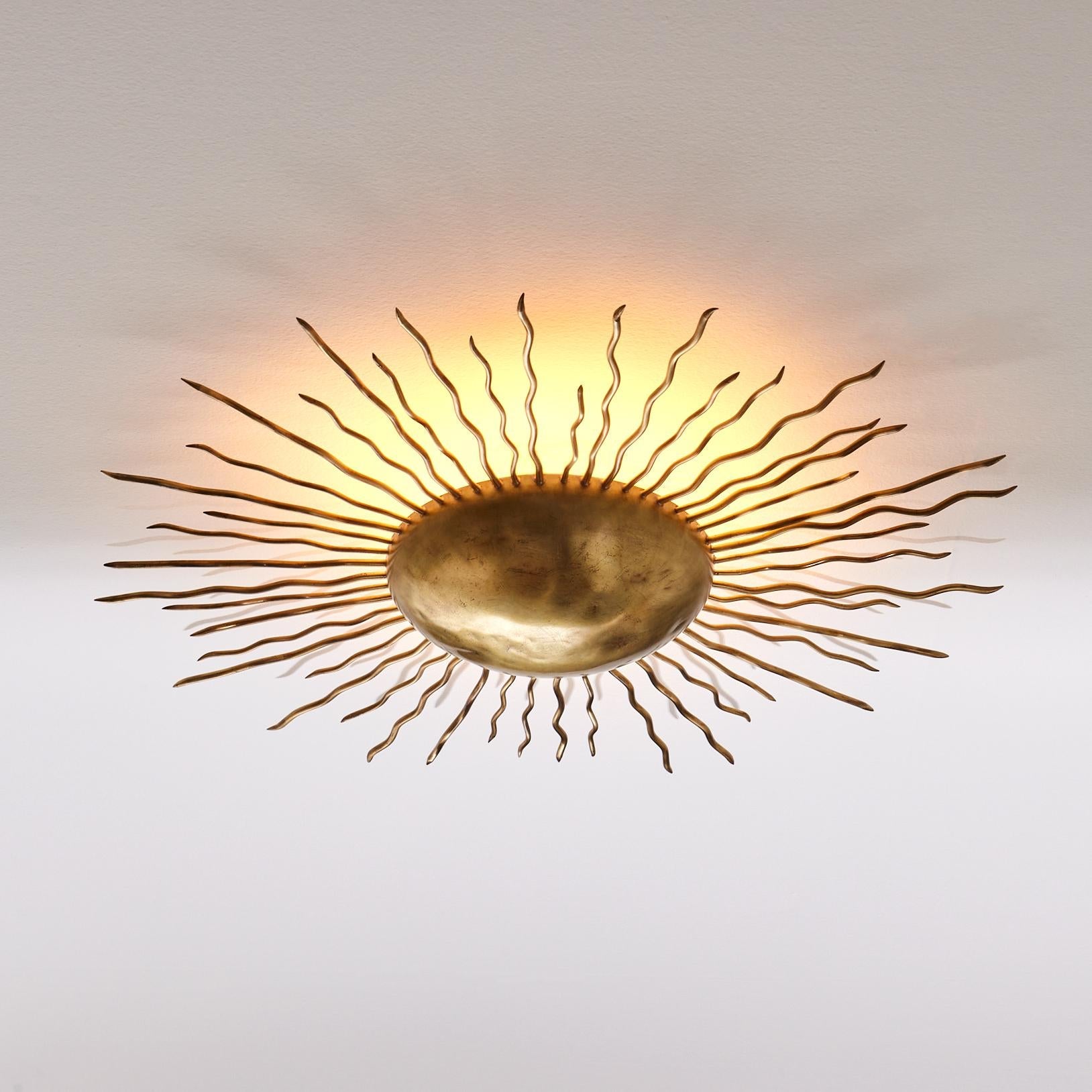 https://a.1stdibscdn.com/sunburst-ceiling-light-by-sister-by-studio-ashby-for-sale-picture-3/f_87162/f_353207521696349618459/The_Sunburst_Light_Sister_By_Studio_Ashby_2_master.jpg