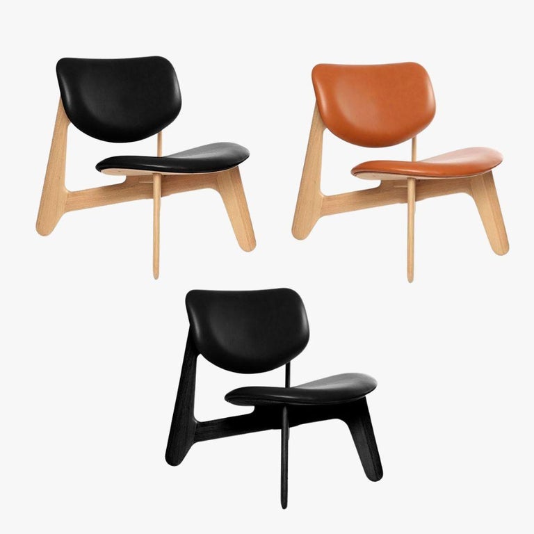 https://a.1stdibscdn.com/tom-dixon-black-stained-oak-and-black-leather-slab-lounge-chair-for-sale-picture-7/f_14472/f_438994721741119555328/Tom_Dixon_Slab_Leather_and_Wood_Lounge_Chair_master.jpg?width=768