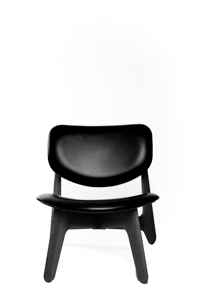 https://a.1stdibscdn.com/tom-dixon-black-stained-oak-and-black-leather-slab-lounge-chair-for-sale-picture-5/f_14472/f_438994721741119553350/Tom_Dixon_Slab_Lounge_Chair_Two_Enlighten_7_master.jpg?width=768