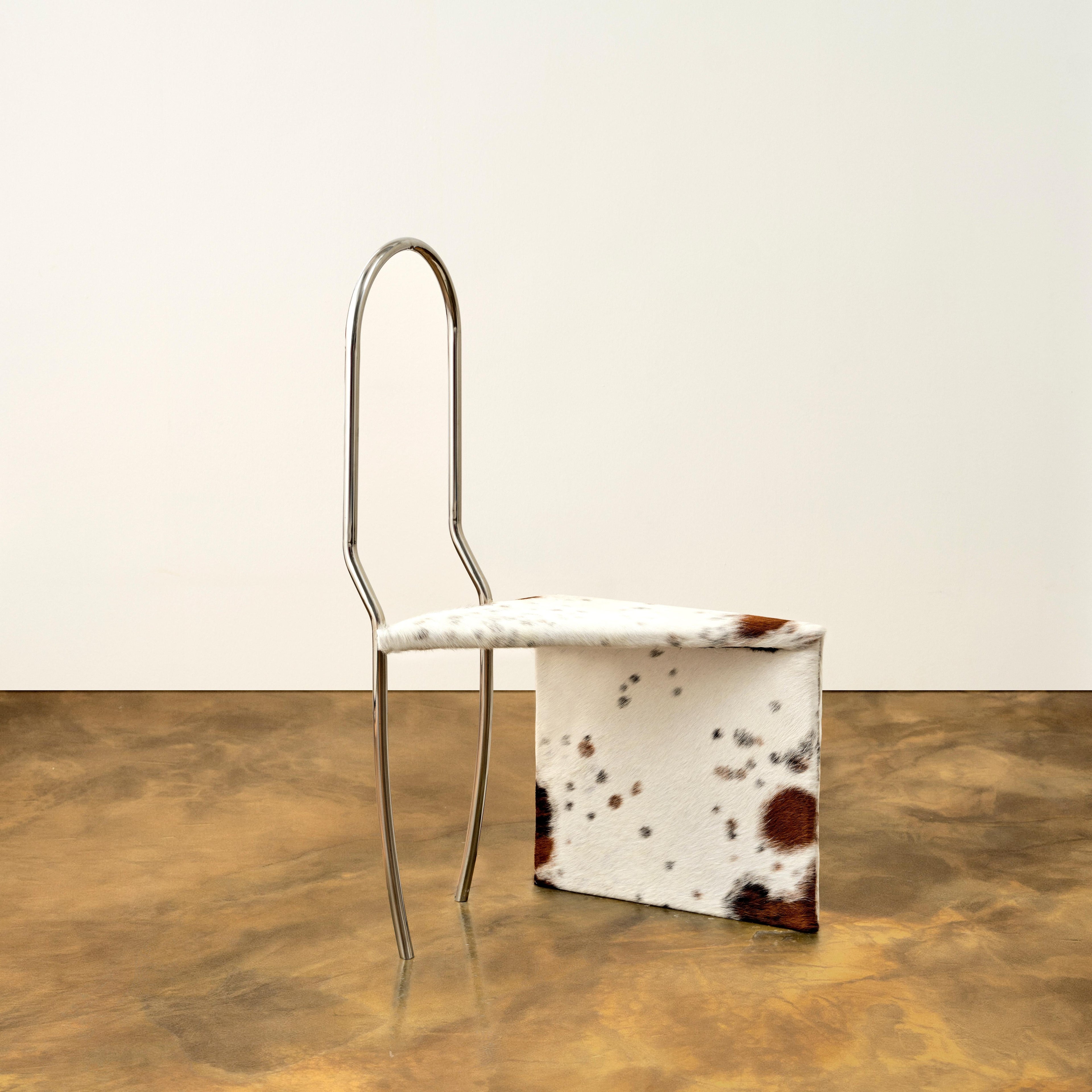 https://a.1stdibscdn.com/twist-chair-in-stainless-steel-and-cowhide-by-animate-objects-for-sale-picture-2/f_12192/f_490700621772635406508/Twist_Chair2_master.jpg