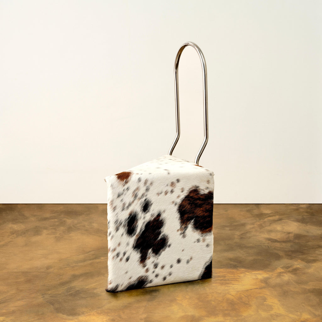 https://a.1stdibscdn.com/twist-chair-in-stainless-steel-and-cowhide-by-animate-objects-for-sale-picture-3/f_12192/f_490700621772635407194/Twist_Chair3_master.jpg