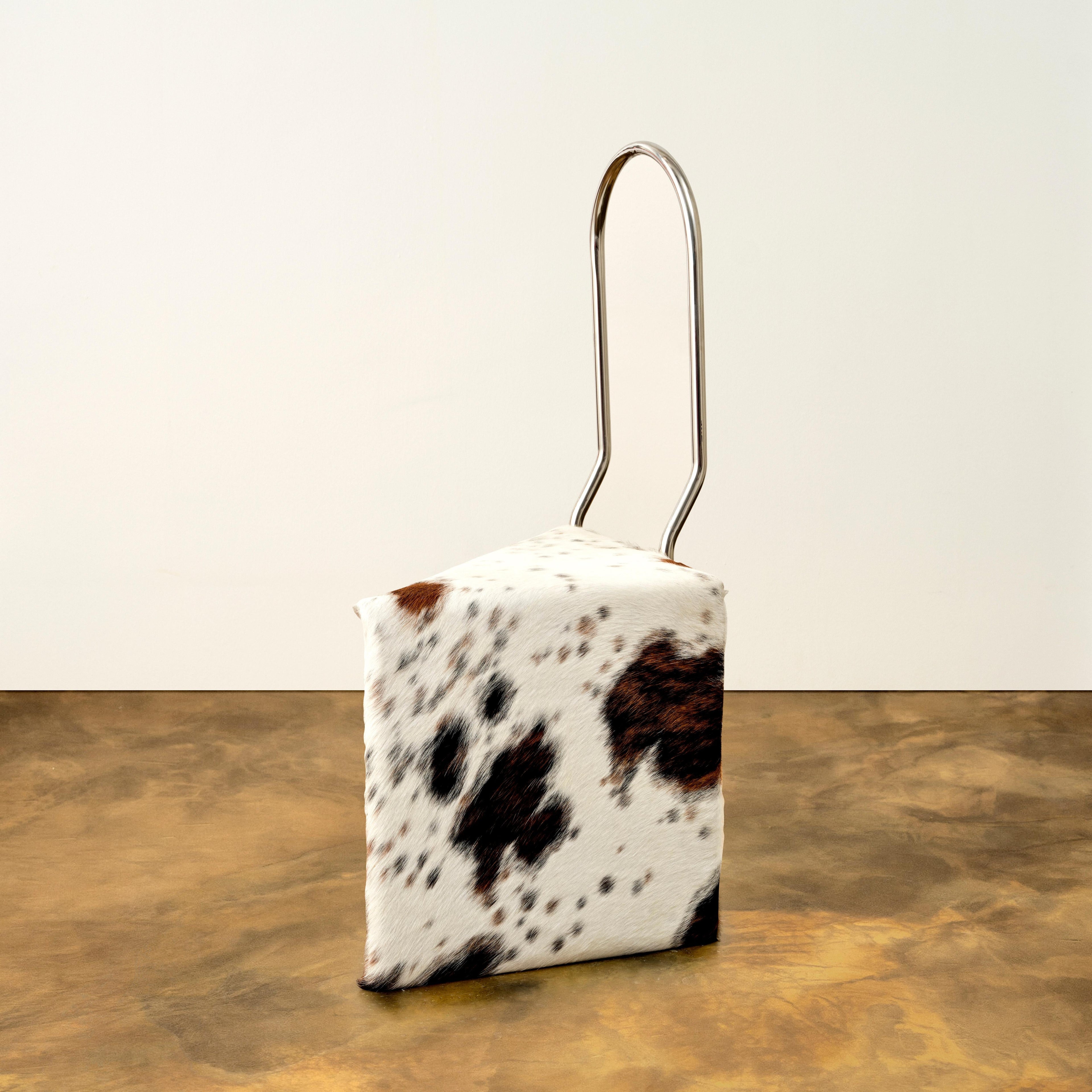 https://a.1stdibscdn.com/twist-chair-in-stainless-steel-and-cowhide-by-animate-objects-for-sale-picture-3/f_12192/f_490700621772635407194/Twist_Chair3_master.jpg