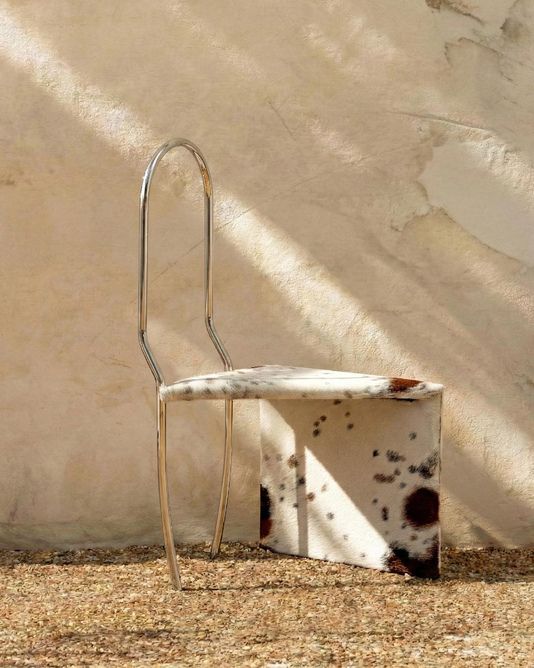 https://a.1stdibscdn.com/twist-chair-in-stainless-steel-and-cowhide-by-animate-objects-for-sale-picture-5/f_12192/f_490700621772635450565/Twist_Chair__master.jpg
