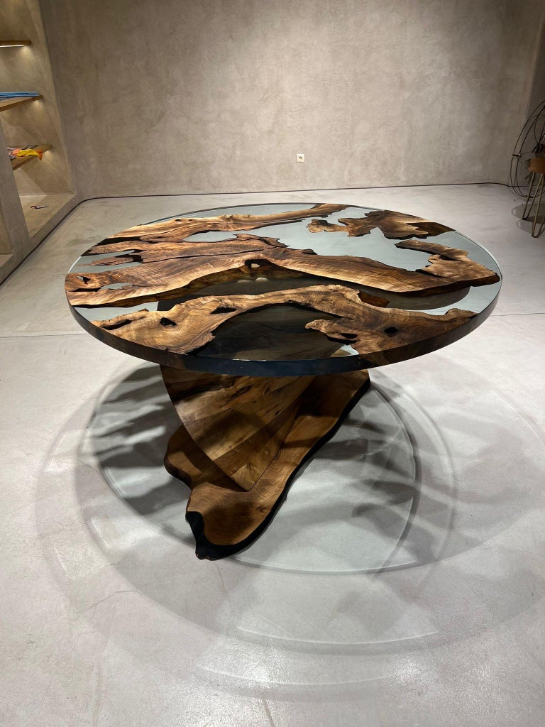 https://a.1stdibscdn.com/tywin-round-dining-table-swirl-walnut-wood-crystal-clear-resin-epoxy-for-sale-picture-8/f_96082/f_385509821708727714871/Tywin_Round_DT_6__master.jpg?width=768
