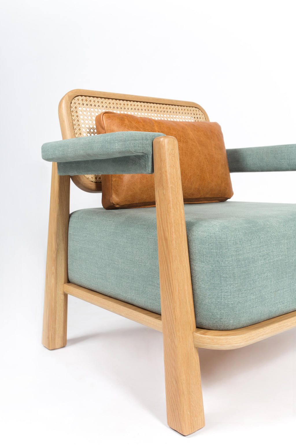 https://a.1stdibscdn.com/toledo-low-armchair-wicker-back-and-solid-oak-contemporary-mexican-design-for-sale-picture-3/f_38111/f_192685021594575084924/_U1A7612_master.jpg