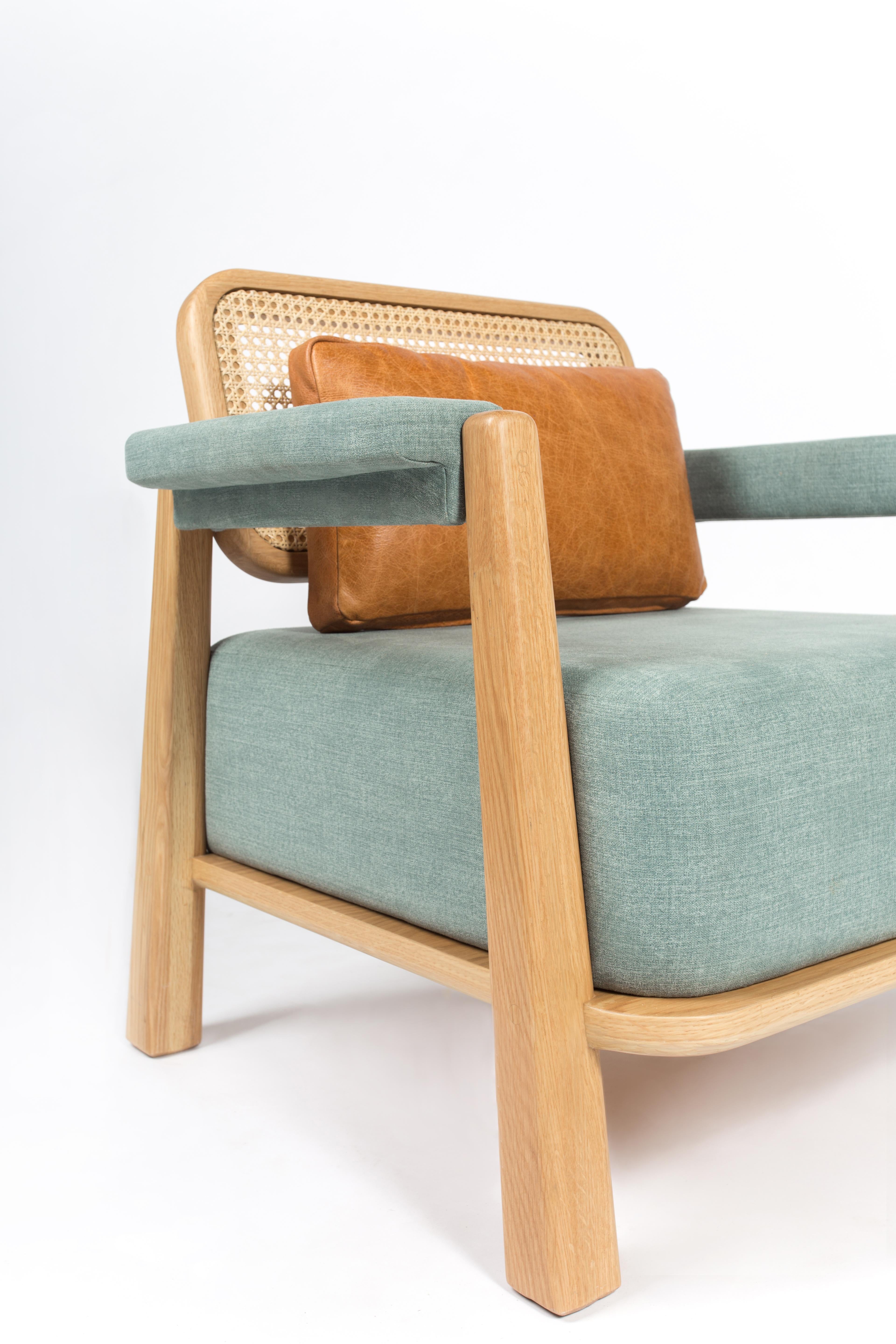 https://a.1stdibscdn.com/toledo-low-armchair-wicker-back-and-solid-oak-contemporary-mexican-design-for-sale-picture-3/f_38111/f_192685021594575084924/_U1A7612_master.jpg