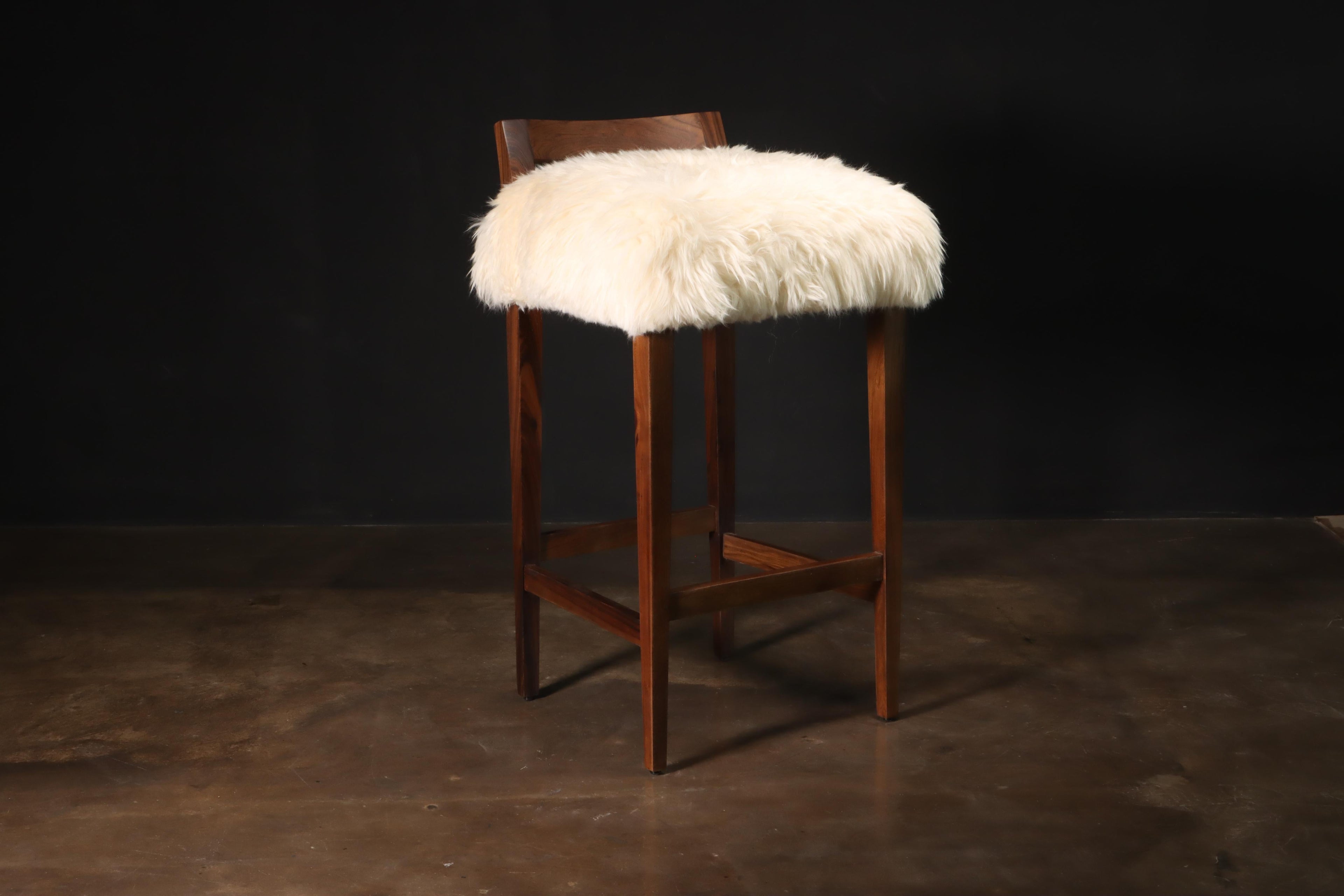 https://a.1stdibscdn.com/sheepskin-and-exotic-wood-contemporary-low-back-stool-from-costantini-umberto-for-sale-picture-2/f_25173/f_318617921671644796876/Umberto_Stool_in_Sheepskin_by_Costantini_00_master.JPG