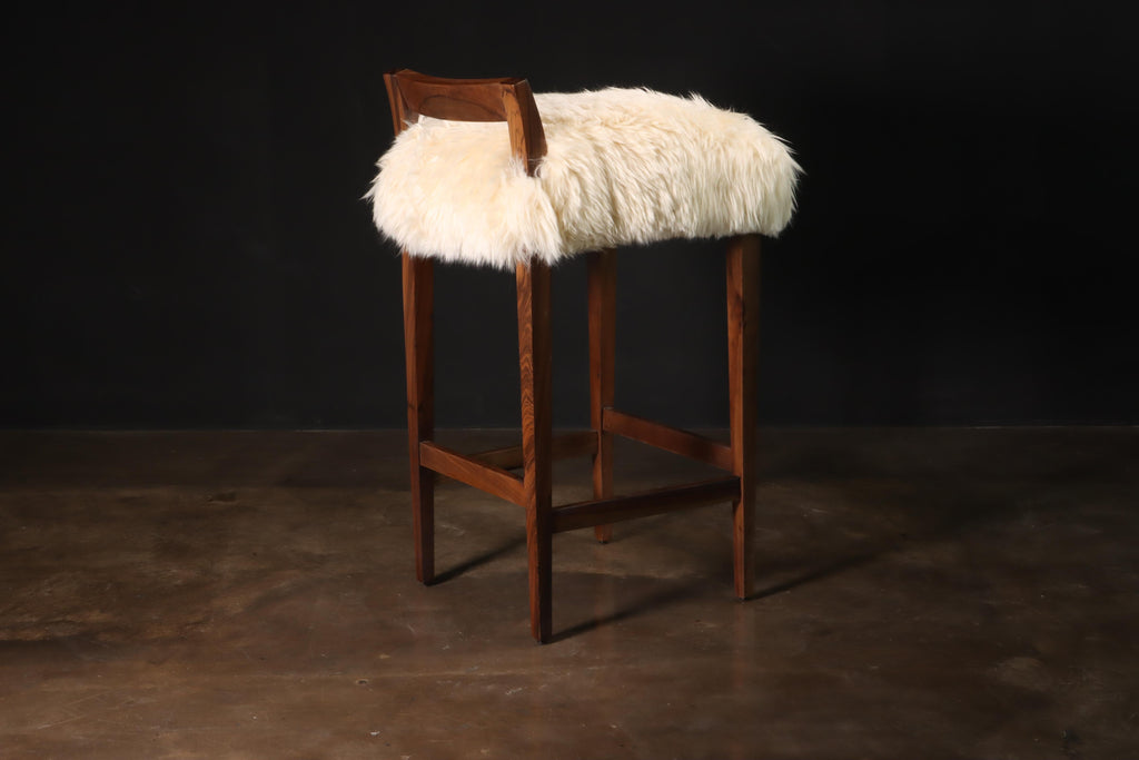 https://a.1stdibscdn.com/sheepskin-and-exotic-wood-contemporary-low-back-stool-from-costantini-umberto-for-sale-picture-3/f_25173/f_318617921671644797714/Umberto_Stool_in_Sheepskin_by_Costantini_01_master.JPG