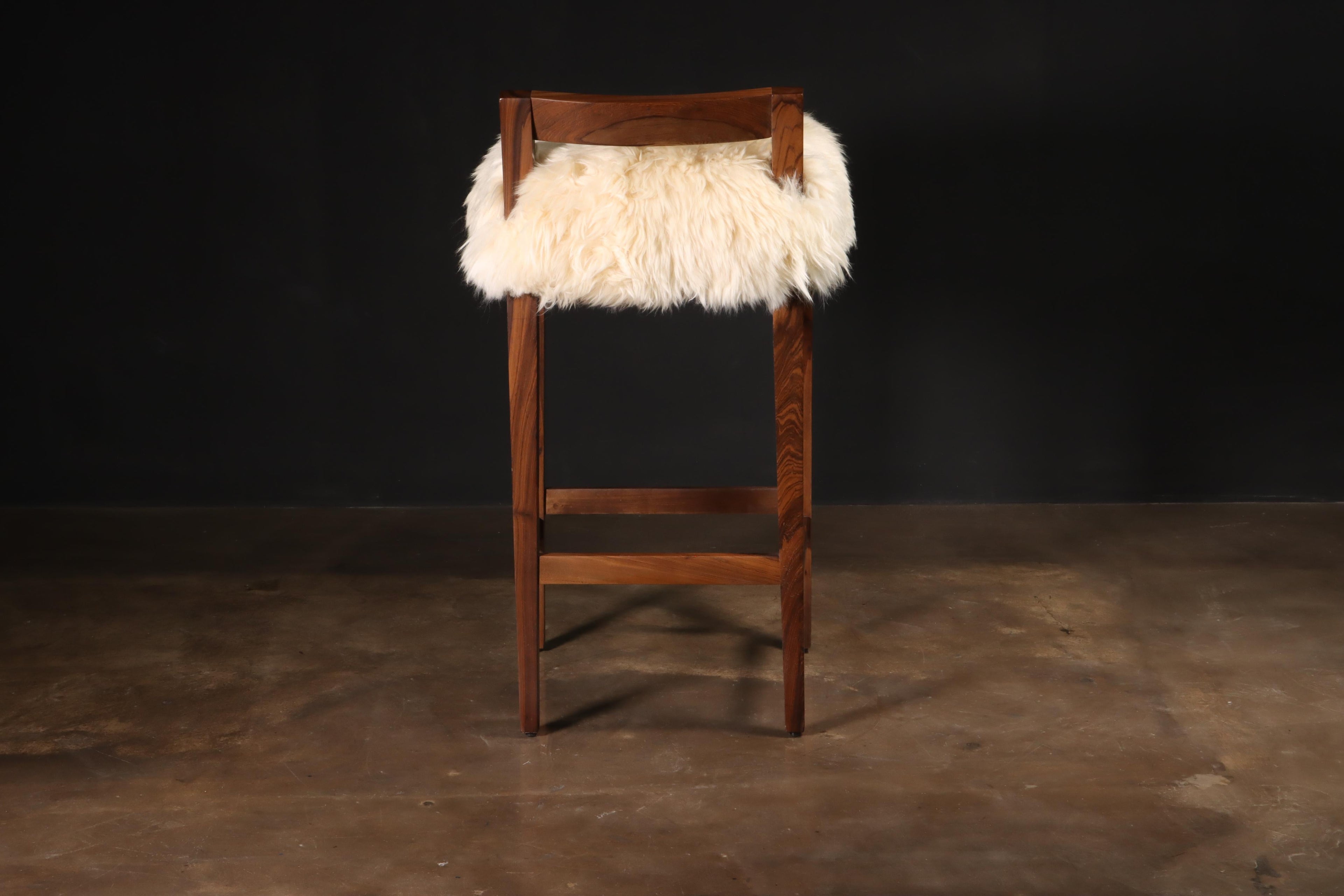 https://a.1stdibscdn.com/sheepskin-and-exotic-wood-contemporary-low-back-stool-from-costantini-umberto-for-sale-picture-5/f_25173/f_318617921671644798431/Umberto_Stool_in_Sheepskin_by_Costantini_03_master.JPG