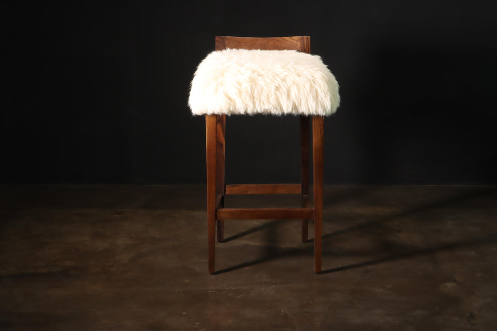 https://a.1stdibscdn.com/sheepskin-and-exotic-wood-contemporary-low-back-stool-from-costantini-umberto-for-sale-picture-6/f_25173/f_318617921671644798277/Umberto_Stool_in_Sheepskin_by_Costantini_04_master.JPG