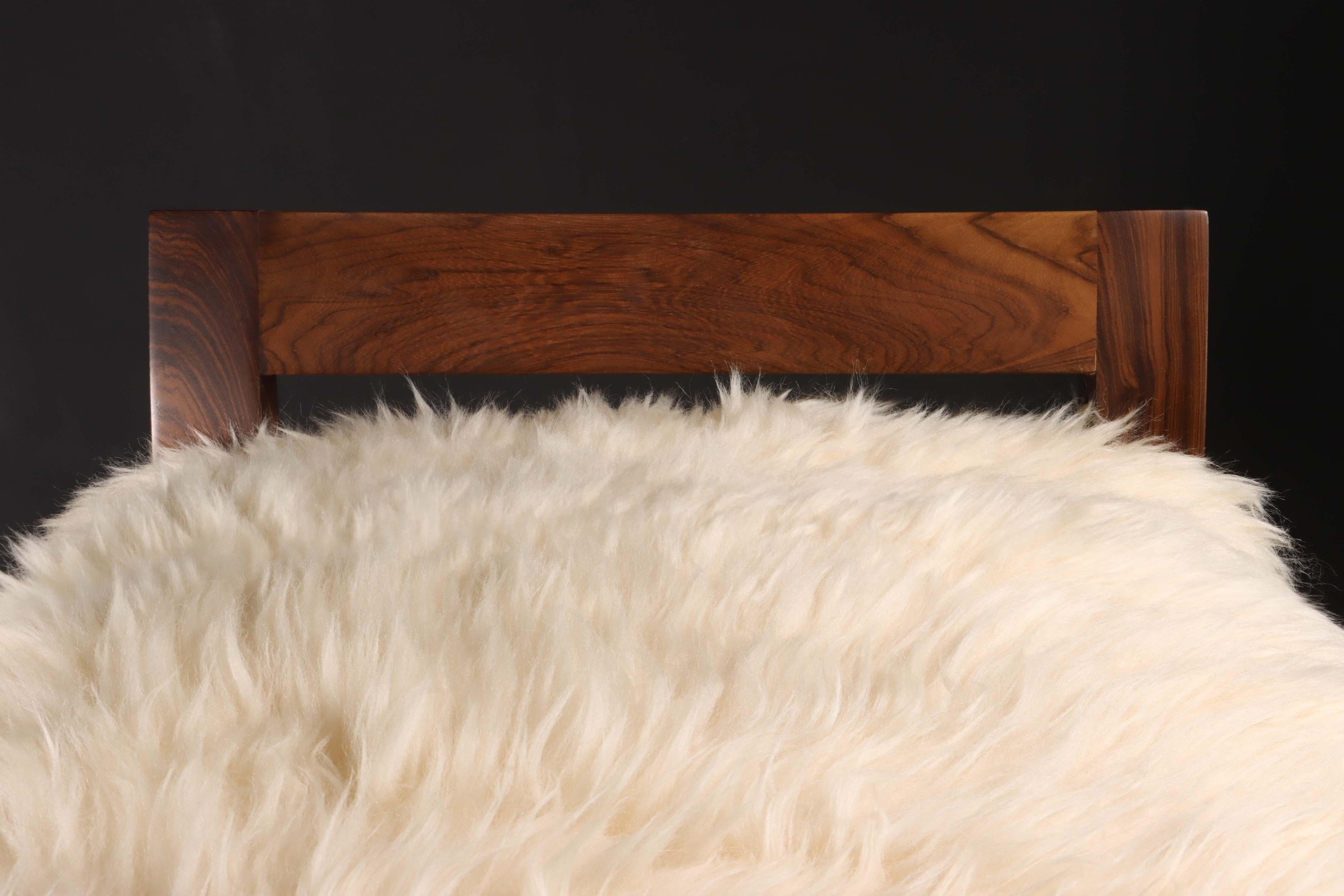 https://a.1stdibscdn.com/sheepskin-and-exotic-wood-contemporary-low-back-stool-from-costantini-umberto-for-sale-picture-7/f_25173/f_318617921671644796025/Umberto_Stool_in_Sheepskin_by_Costantini_05_master.jpg