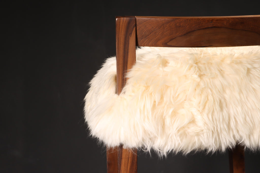 https://a.1stdibscdn.com/sheepskin-and-exotic-wood-contemporary-low-back-stool-from-costantini-umberto-for-sale-picture-9/f_25173/f_318617921671644802953/Umberto_Stool_in_Sheepskin_by_Costantini_07_master.JPG