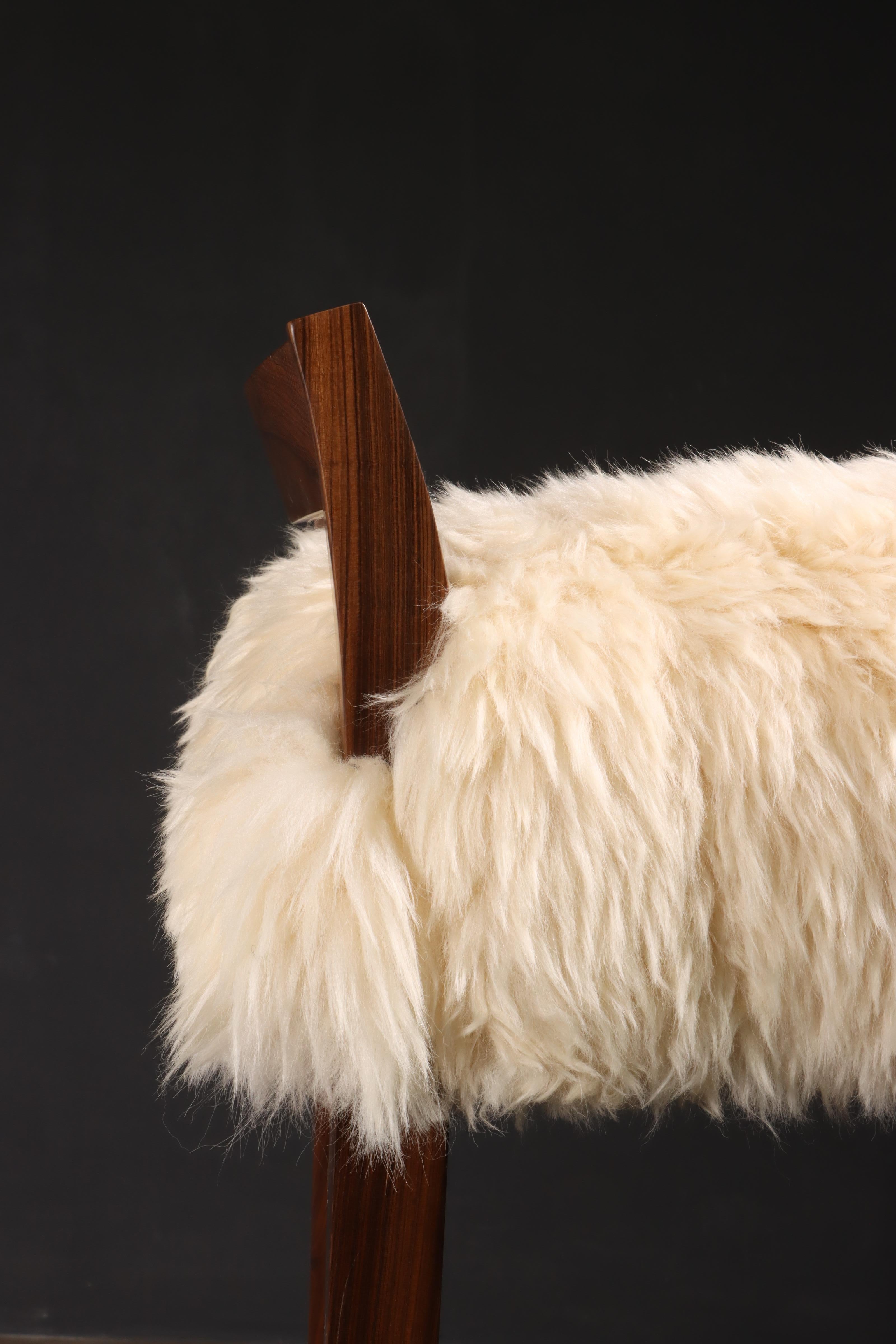 https://a.1stdibscdn.com/sheepskin-and-exotic-wood-contemporary-low-back-stool-from-costantini-umberto-for-sale-picture-8/f_25173/f_31861792/Umberto_Stool_in_Sheepskin_by_Costantini_1671644853583_master.JPG