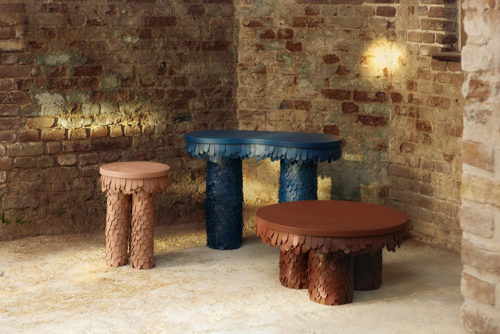 https://a.1stdibscdn.com/round-textured-organic-black-leather-and-wood-coffee-table-for-sale-picture-6/f_19173/f_464281921756289853220/Uniqka_Betsy_Collection_by_Lara_Bohinc_01_master.jpg