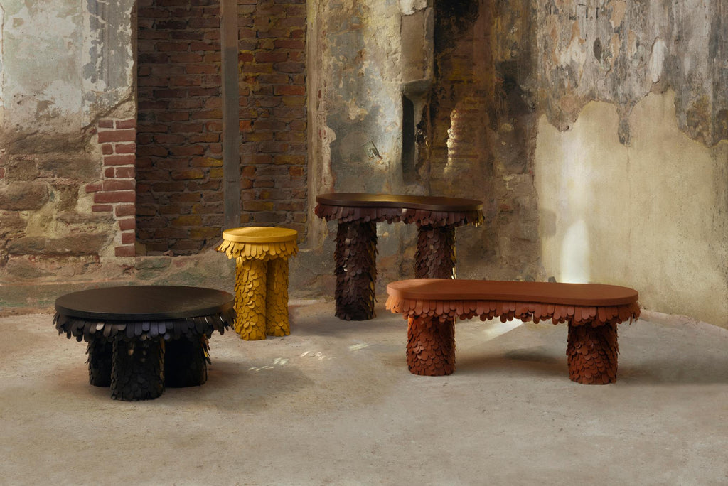 https://a.1stdibscdn.com/round-textured-organic-black-leather-and-wood-coffee-table-for-sale-picture-7/f_19173/f_464281921756289853836/Uniqka_Betsy_Collection_by_Lara_Bohinc_02_master.jpg