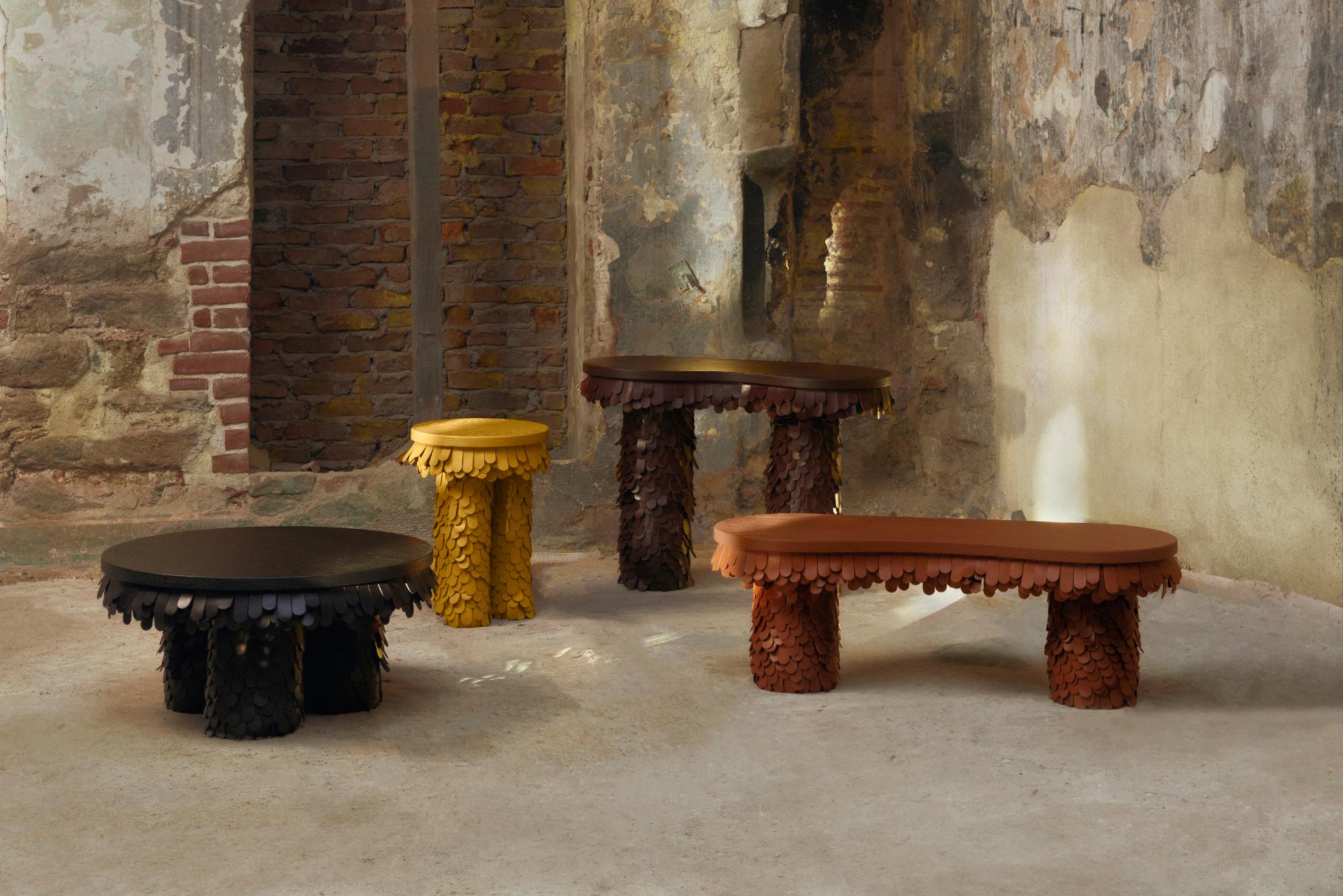 https://a.1stdibscdn.com/round-textured-organic-black-leather-and-wood-coffee-table-for-sale-picture-7/f_19173/f_464281921756289853836/Uniqka_Betsy_Collection_by_Lara_Bohinc_02_master.jpg