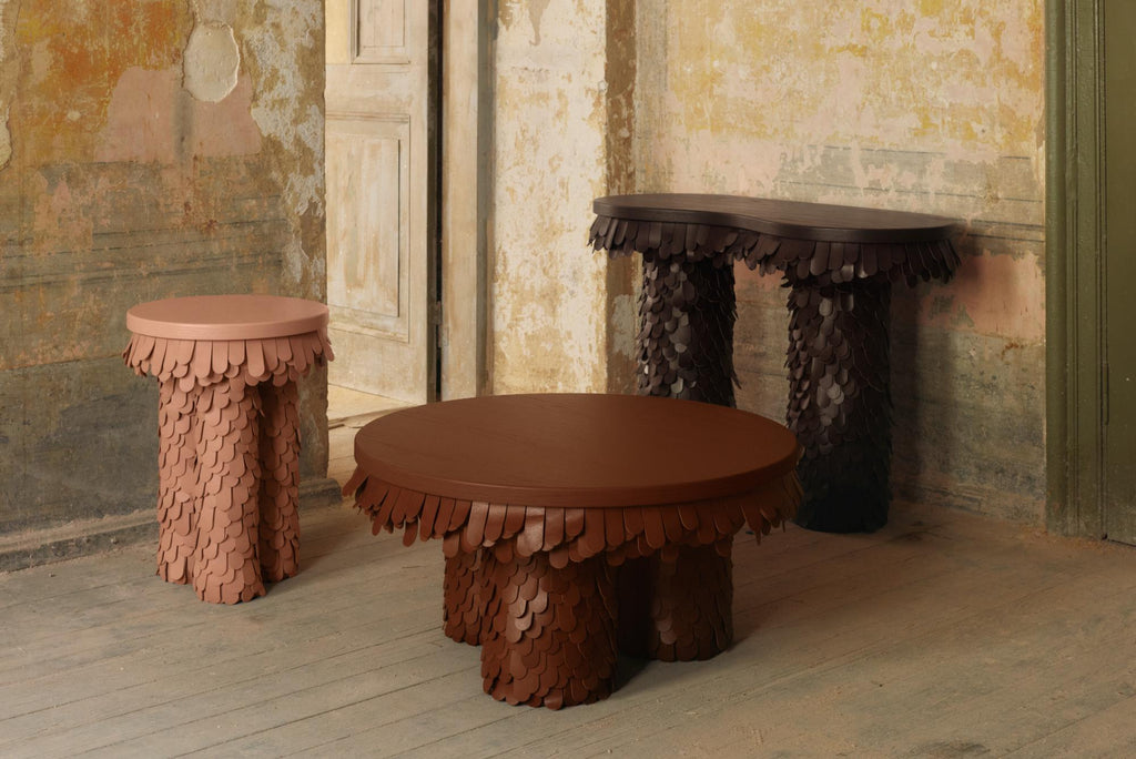 https://a.1stdibscdn.com/round-textured-organic-black-leather-and-wood-coffee-table-for-sale-picture-9/f_19173/f_464281921756289855160/Uniqka_Betsy_Collection_by_Lara_Bohinc_04_master.jpg