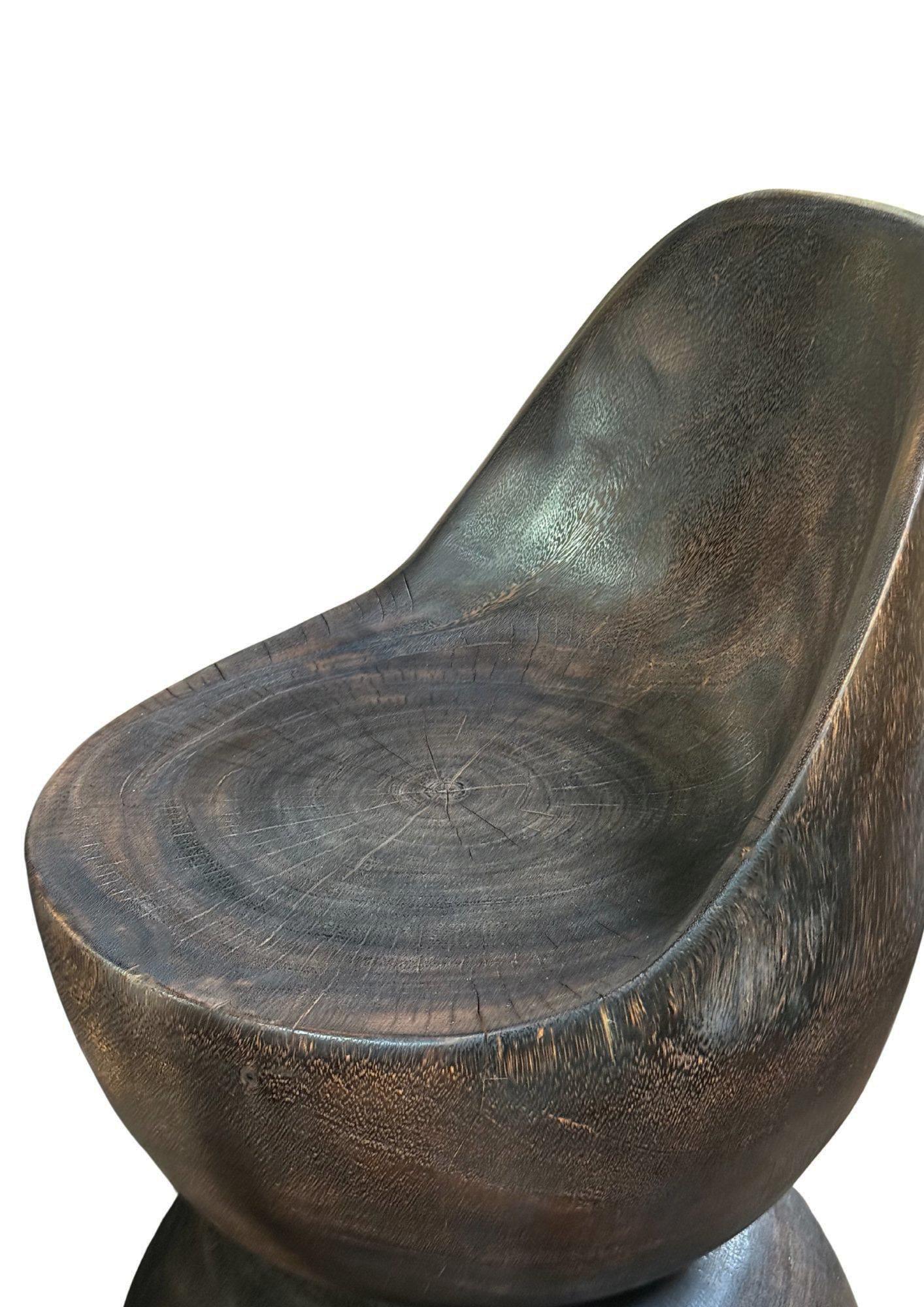 https://a.1stdibscdn.com/sculptural-chair-carved-from-solid-suar-wood-modern-organic-espresso-finish-for-sale-picture-3/f_58812/f_477196221764165054462/Untitled_Flyer_A4_2025_11_26T214222_706_master.jpg