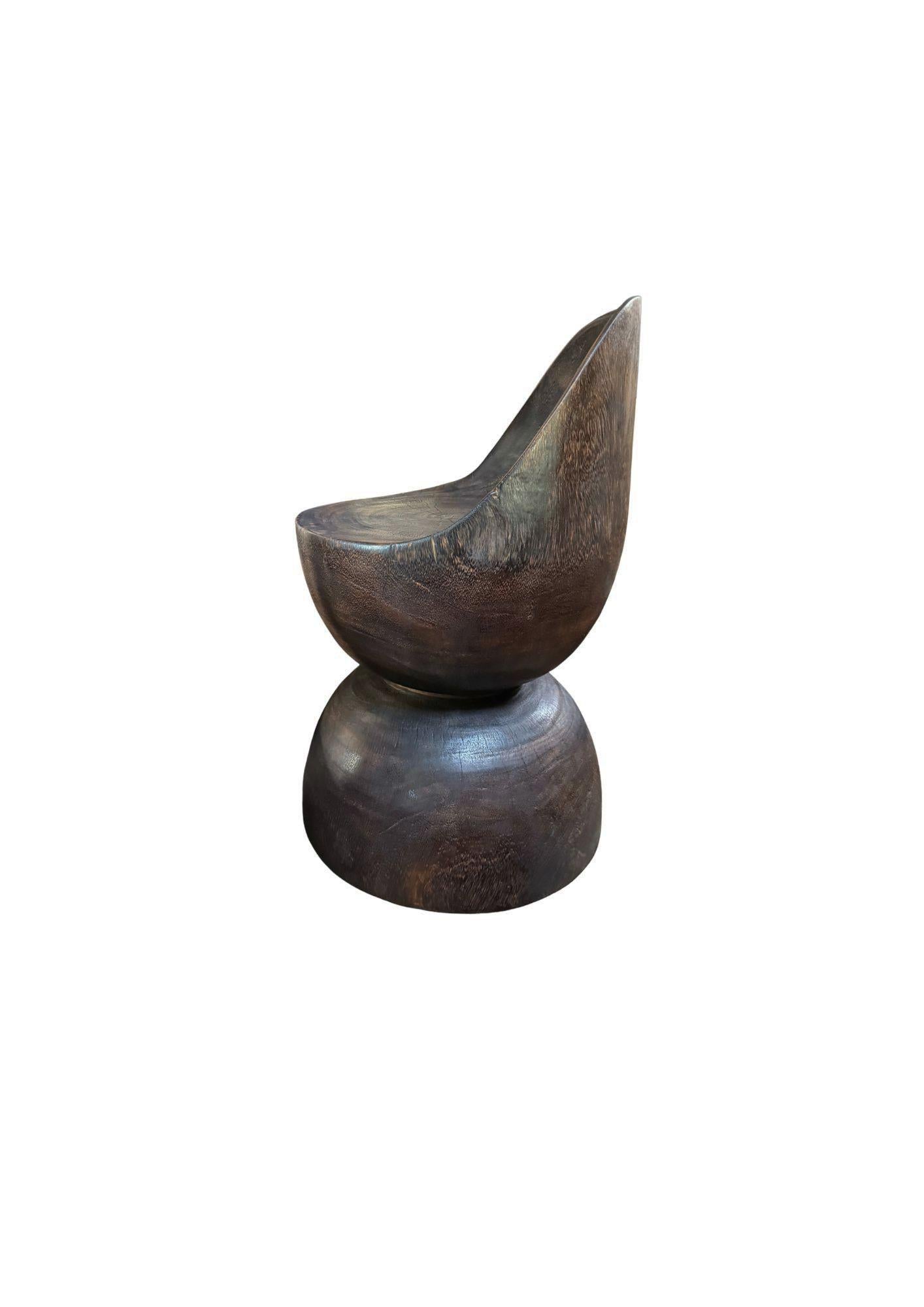 https://a.1stdibscdn.com/sculptural-chair-carved-from-solid-suar-wood-modern-organic-espresso-finish-for-sale-picture-6/f_58812/f_477196221764165052533/Untitled_Flyer_A4_2025_11_26T214331_887_master.jpg