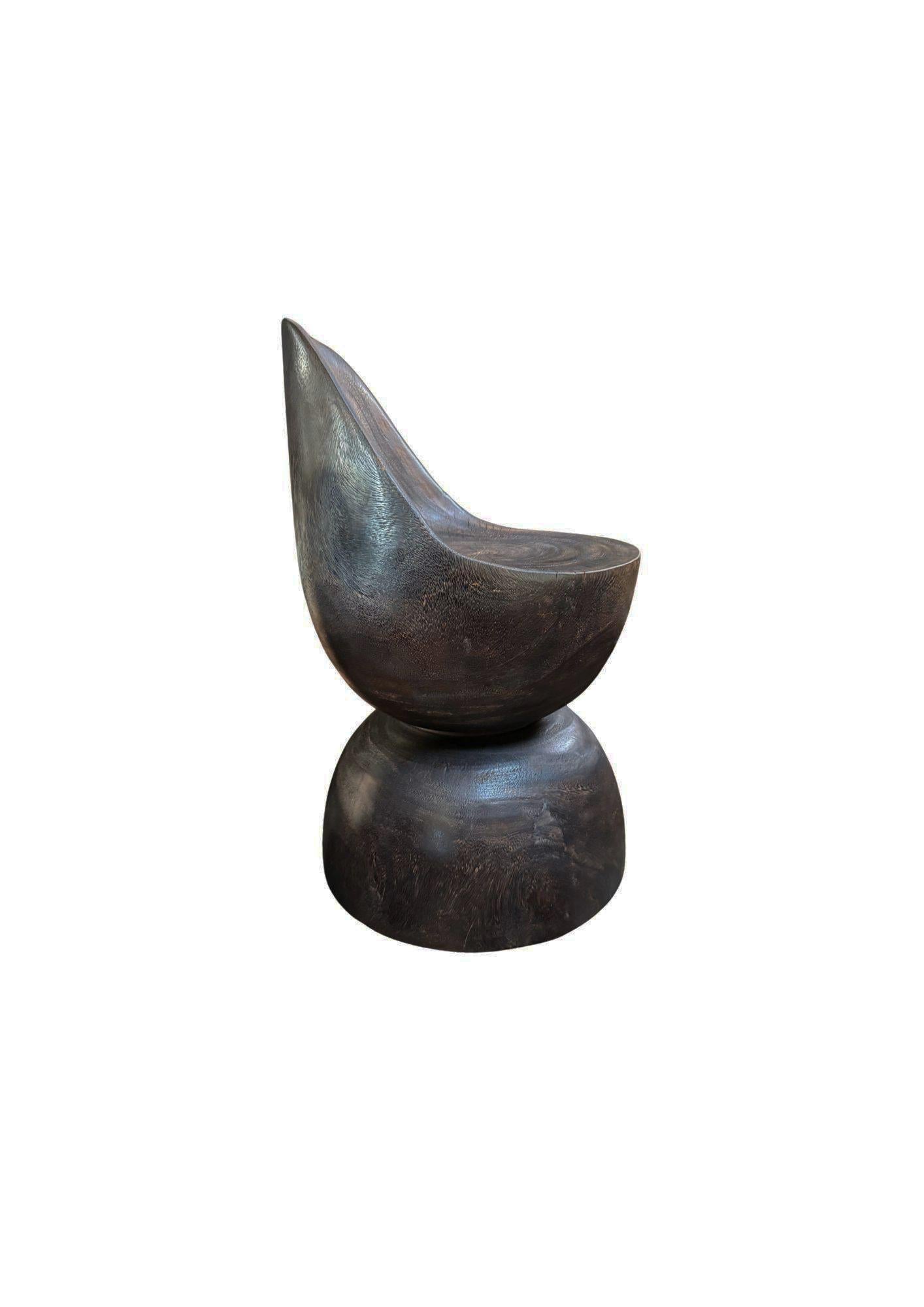 https://a.1stdibscdn.com/sculptural-chair-carved-from-solid-suar-wood-modern-organic-espresso-finish-for-sale-picture-2/f_58812/f_477196221764165054095/Untitled_Flyer_A4_2025_11_26T214521_734_master.jpg
