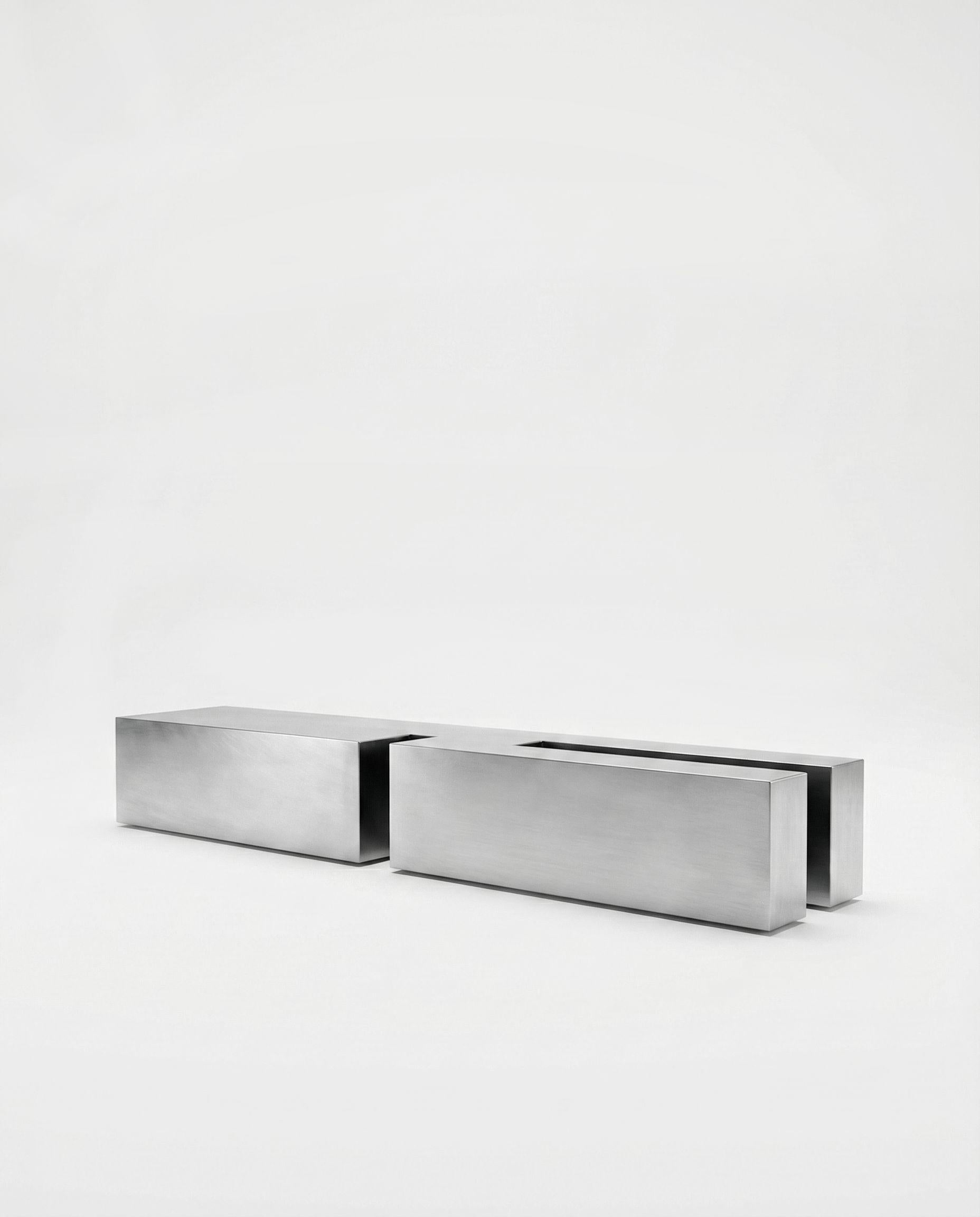 https://a.1stdibscdn.com/untitled-lv-stainless-steel-coffee-table-by-pietro-franceschini-for-sale-picture-3/f_12192/f_491632421773153912229/Untitled_LV_1_Pietro_Franceschini_master.jpg
