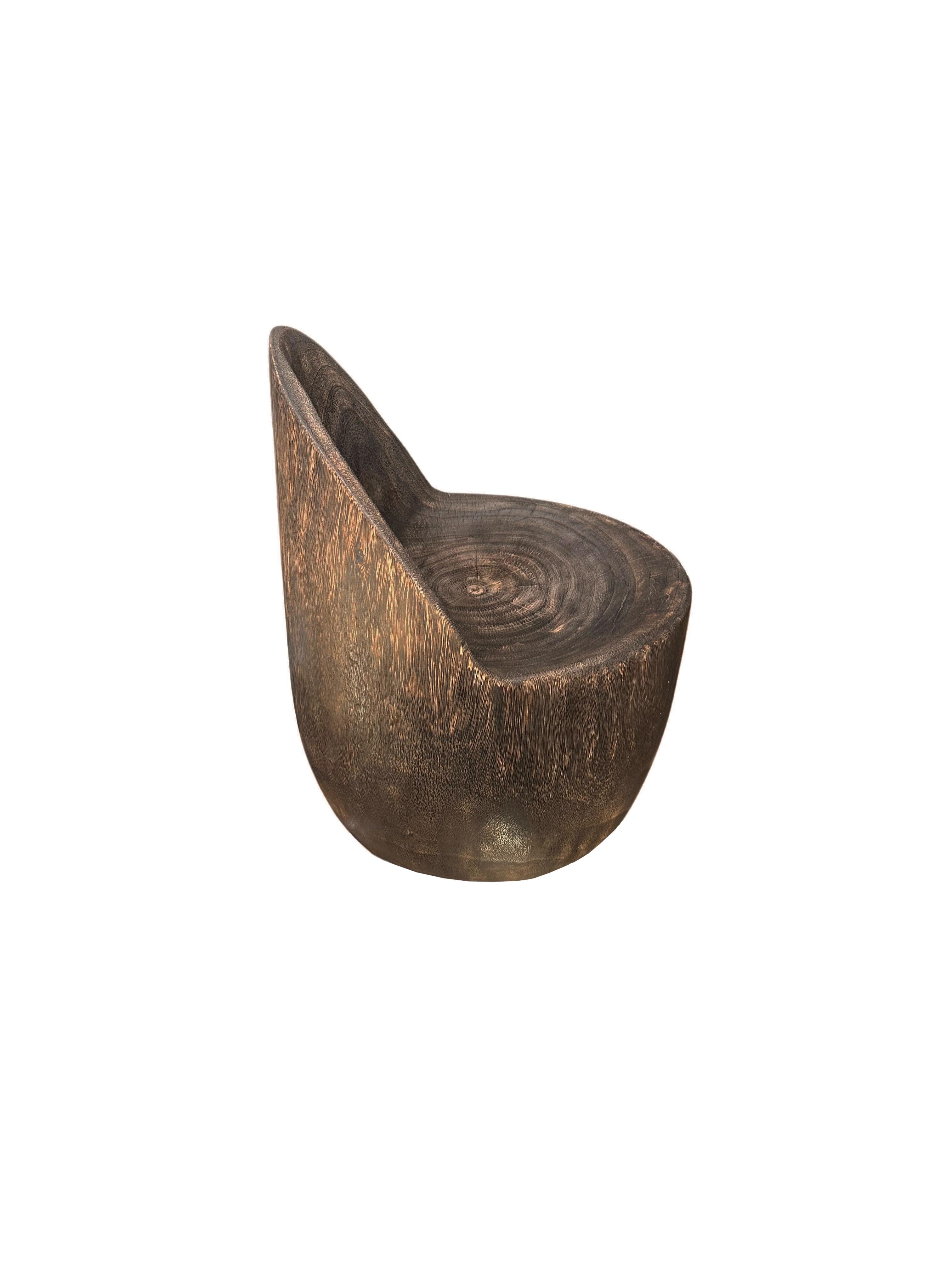 https://a.1stdibscdn.com/sculptural-lounge-chair-carved-from-solid-suar-wood-modern-organic-for-sale-picture-4/f_58812/f_407505921721728090402/Untitled_design_2024_07_23T144053_611_master.jpg