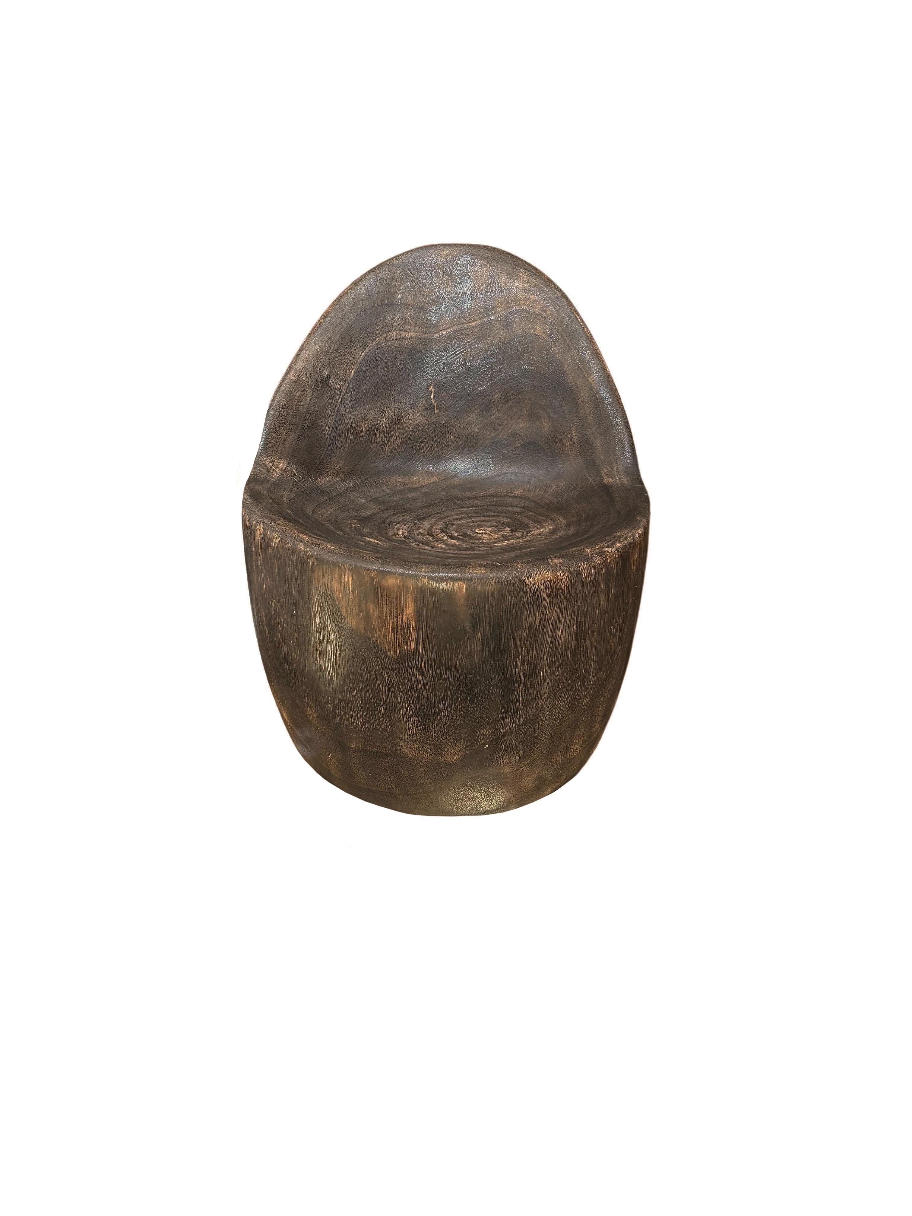 https://a.1stdibscdn.com/sculptural-lounge-chair-carved-from-solid-suar-wood-modern-organic-for-sale-picture-3/f_58812/f_407505921721728090444/Untitled_design_2024_07_23T163654_096_master.jpg
