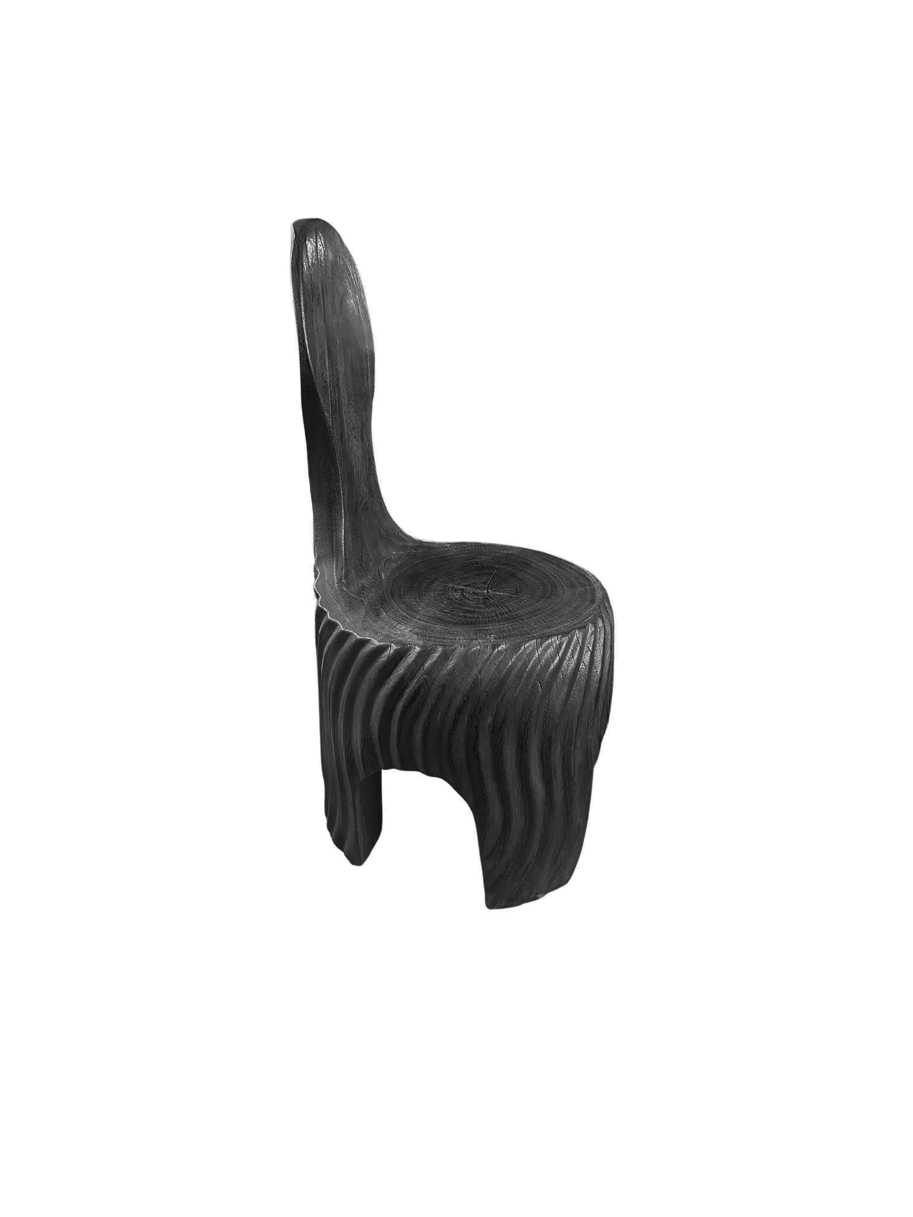 https://a.1stdibscdn.com/sculptural-mango-wood-chair-with-carved-detailing-modern-organic-burnt-finish-for-sale-picture-3/f_58812/f_420683221730129712177/Untitled_design_2024_10_28T202829_384_master.jpg