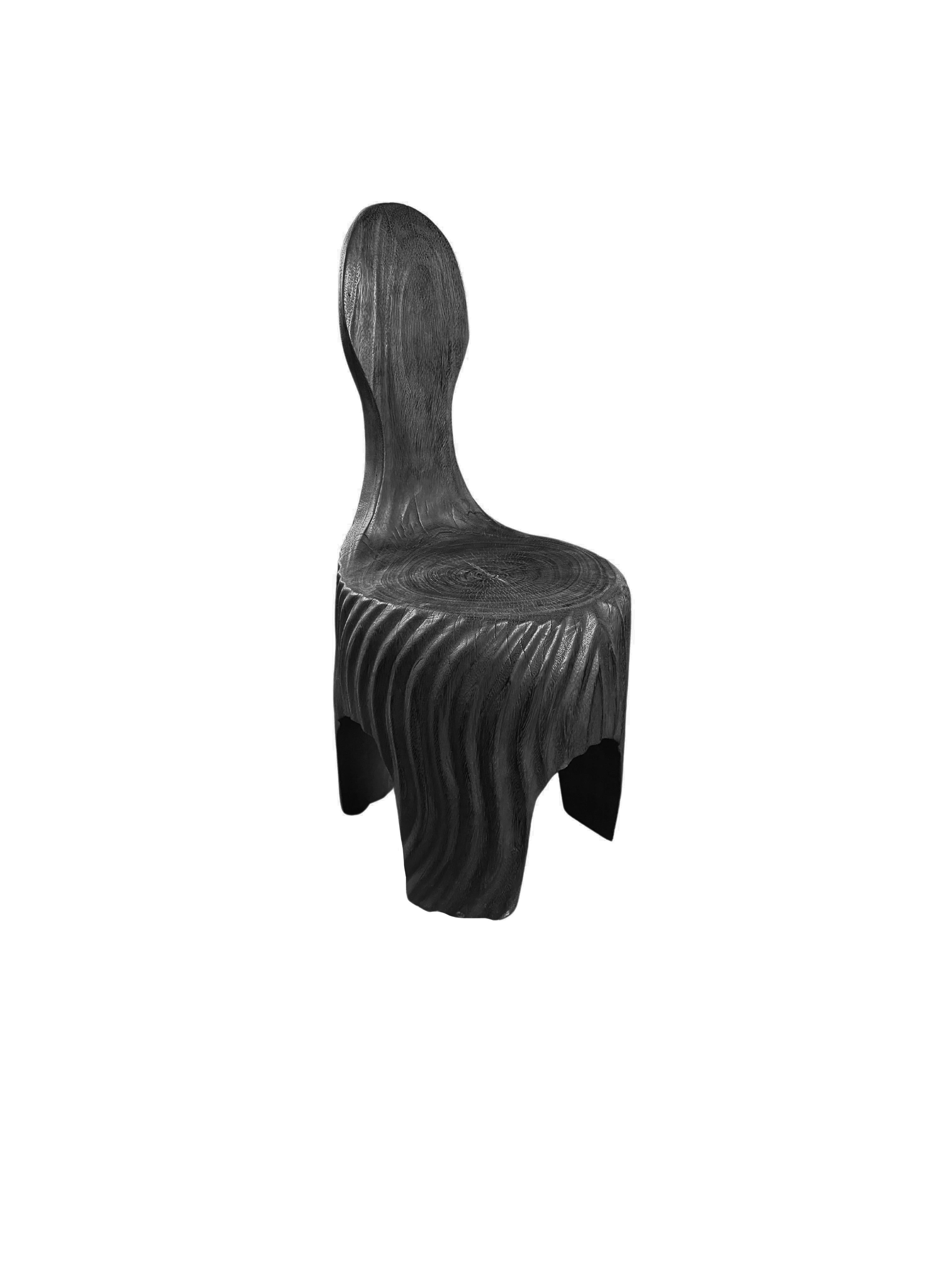 https://a.1stdibscdn.com/sculptural-mango-wood-chair-with-carved-detailing-modern-organic-burnt-finish-for-sale-picture-5/f_58812/f_420683221730129712580/Untitled_design_2024_10_28T202942_558_master.jpg
