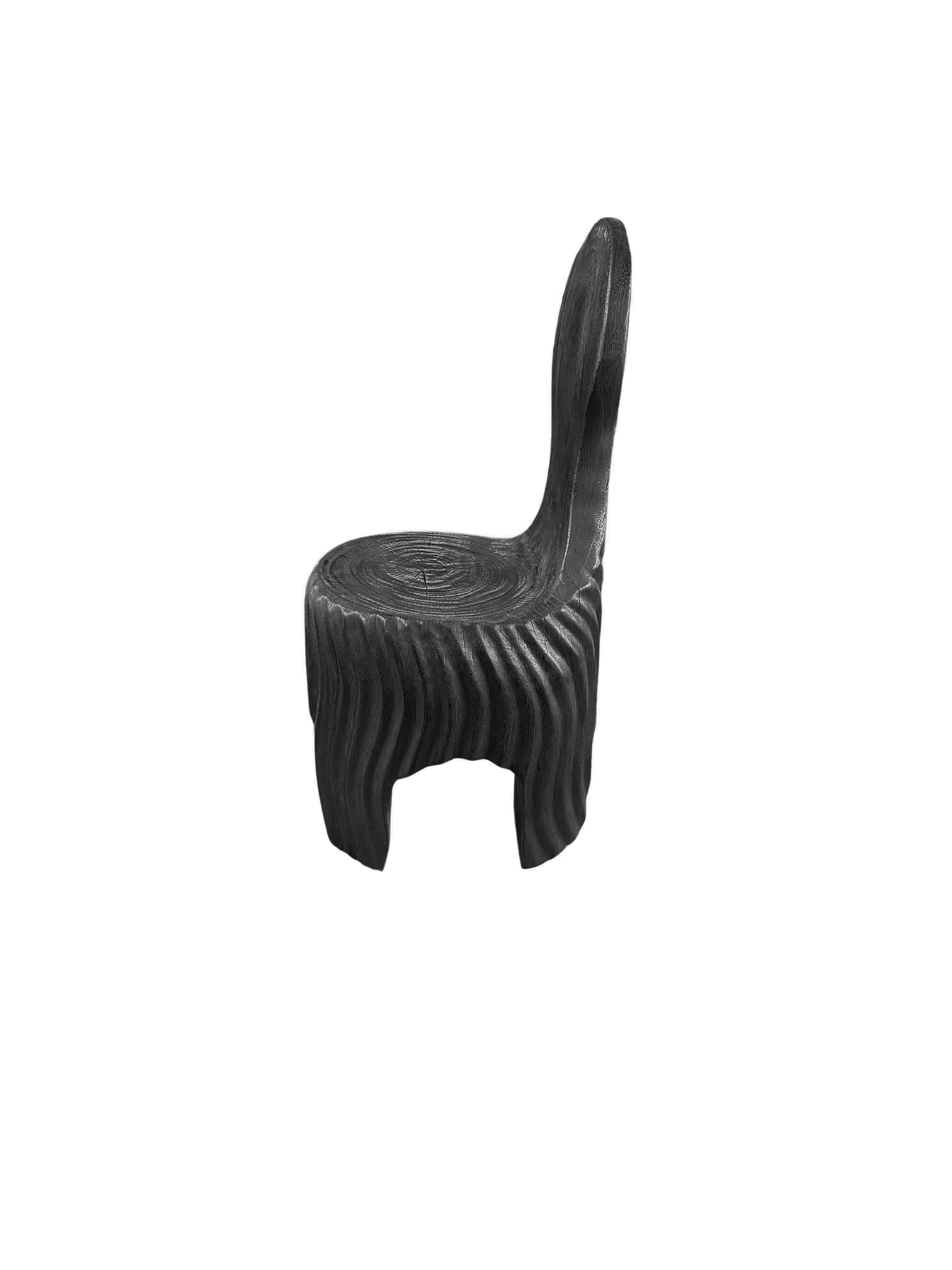 https://a.1stdibscdn.com/sculptural-mango-wood-chair-with-carved-detailing-modern-organic-burnt-finish-for-sale-picture-7/f_58812/f_420683221730129712568/Untitled_design_2024_10_28T203034_439_master.jpg