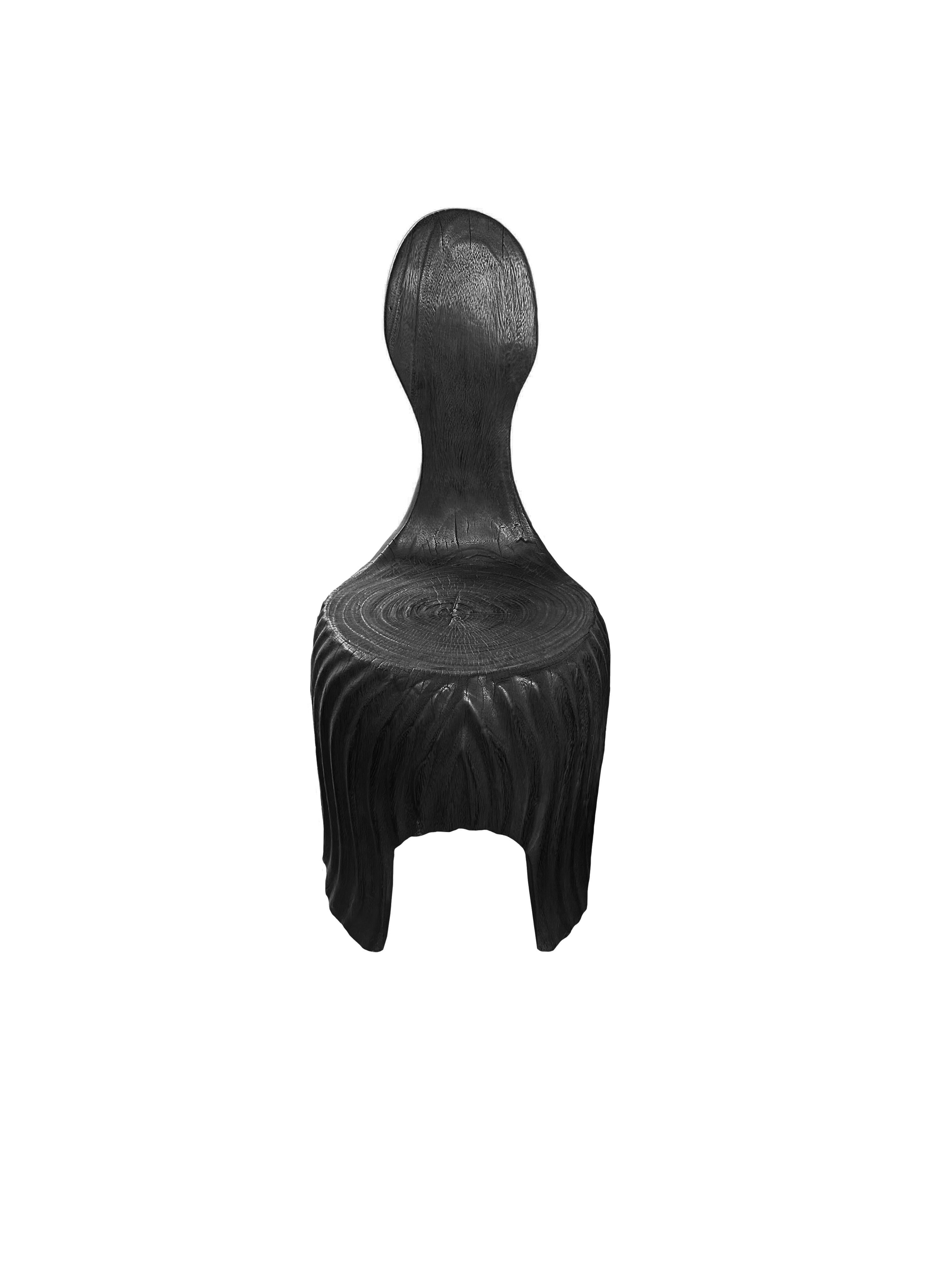 https://a.1stdibscdn.com/sculptural-mango-wood-chair-with-carved-detailing-modern-organic-burnt-finish-for-sale-picture-2/f_58812/f_420683221730129712432/Untitled_design_2024_10_28T203118_459_master.jpg