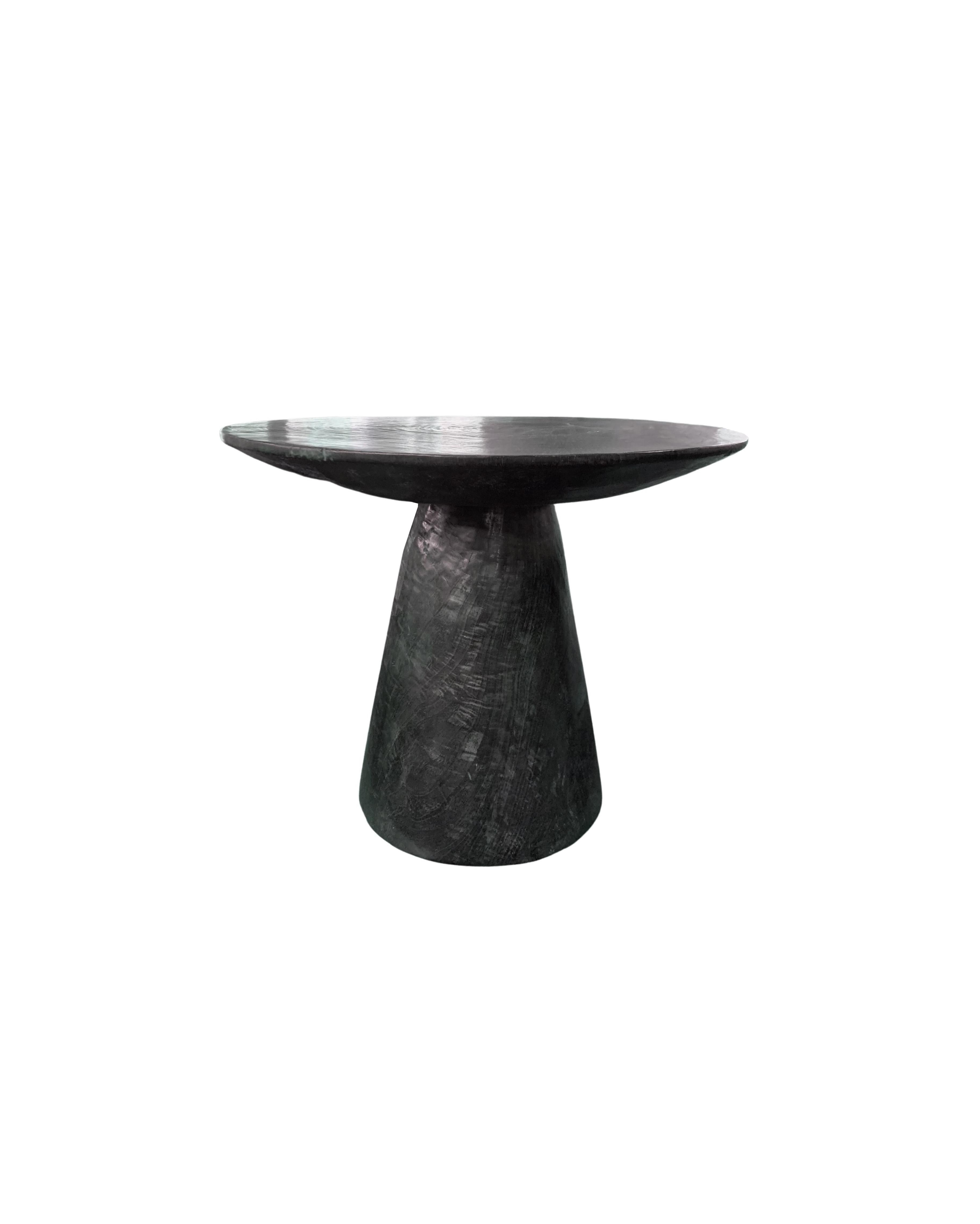 https://a.1stdibscdn.com/sculptural-round-table-crafted-from-mango-wood-burnt-finish-modern-organic-for-sale-picture-3/f_58812/f_295375221657627830044/Untitled_design_63__master.jpg