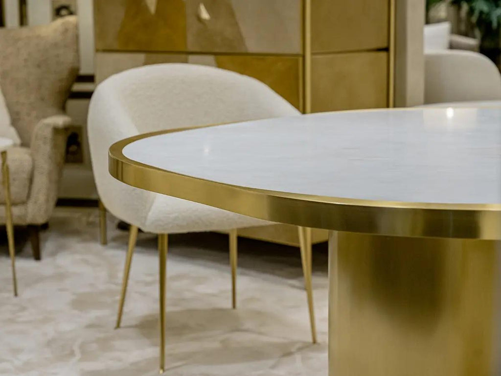 https://a.1stdibscdn.com/solid-brass-dining-set-marble-table-with-scalloped-base-4-ivory-boucle-chairs-for-sale-picture-4/f_27693/f_463604821755804704204/Wave_ambiente_master.jpg