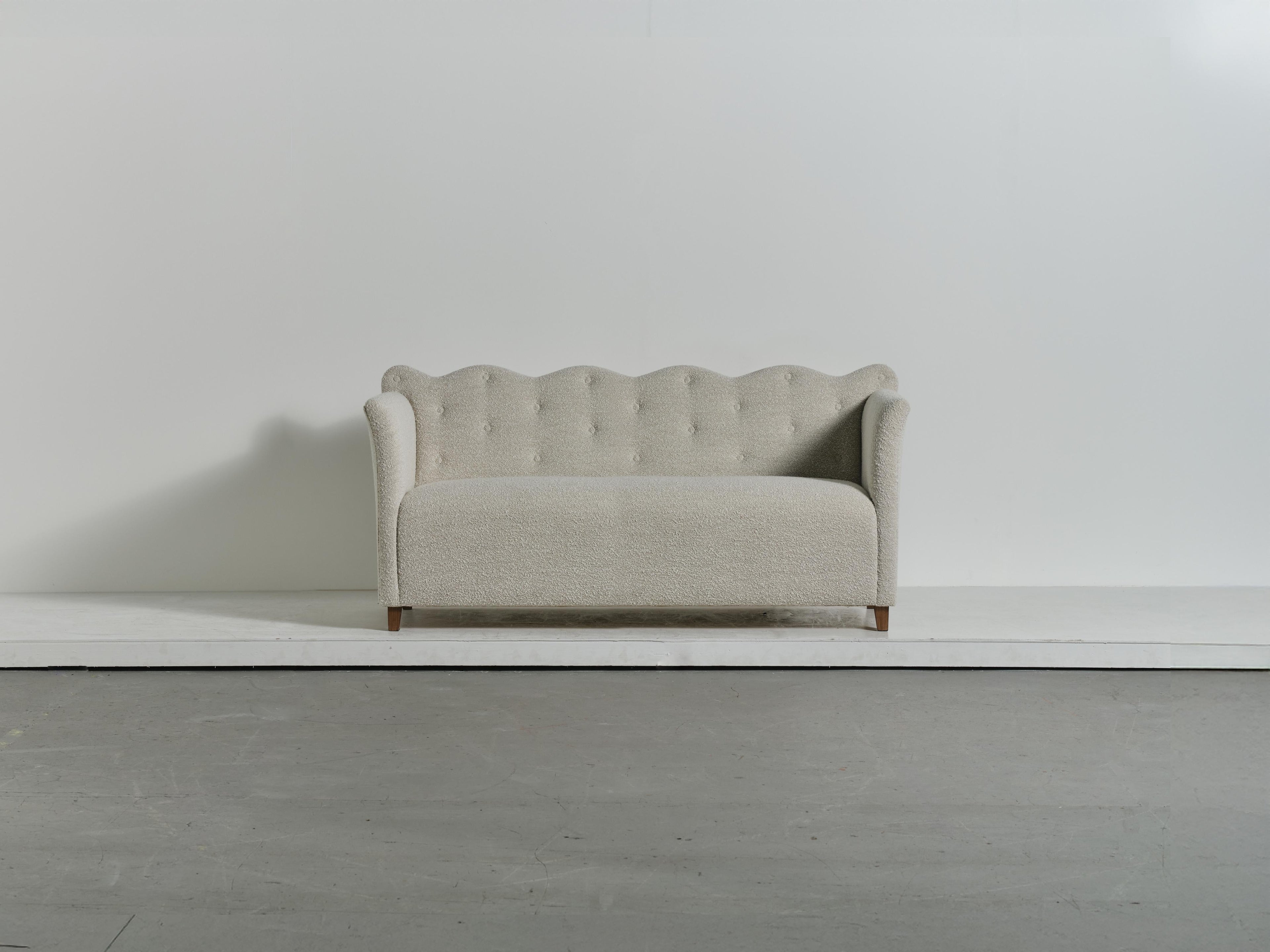 https://a.1stdibscdn.com/wavy-back-sofa-upholstered-in-lelievre-wool-boucle-for-sale-picture-3/f_22593/f_486201321770049814534/Wavy_Back_Sofa_0140_11_Ex_master.jpg