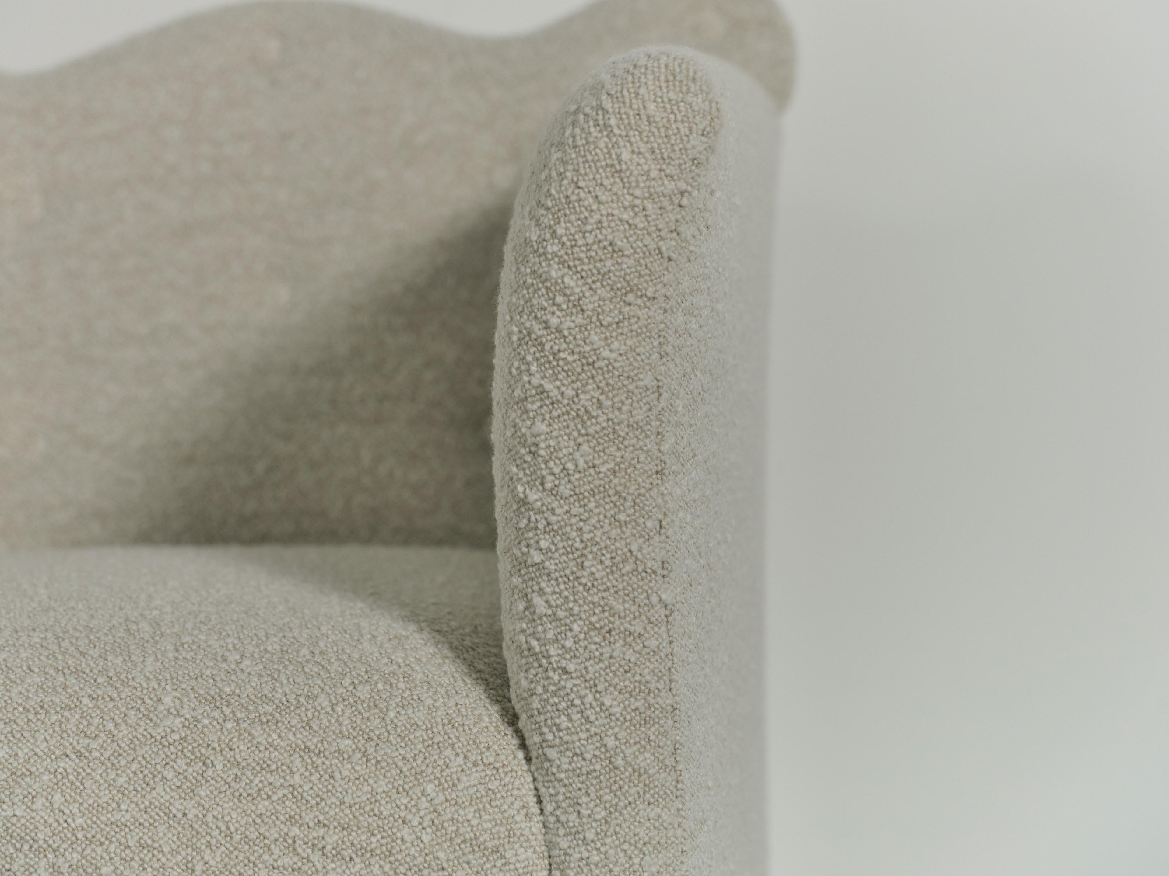 https://a.1stdibscdn.com/wavy-back-sofa-upholstered-in-lelievre-wool-boucle-for-sale-picture-7/f_22593/f_486201321770049856193/Wavy_Back_Sofa_0155_11_25_master.jpg