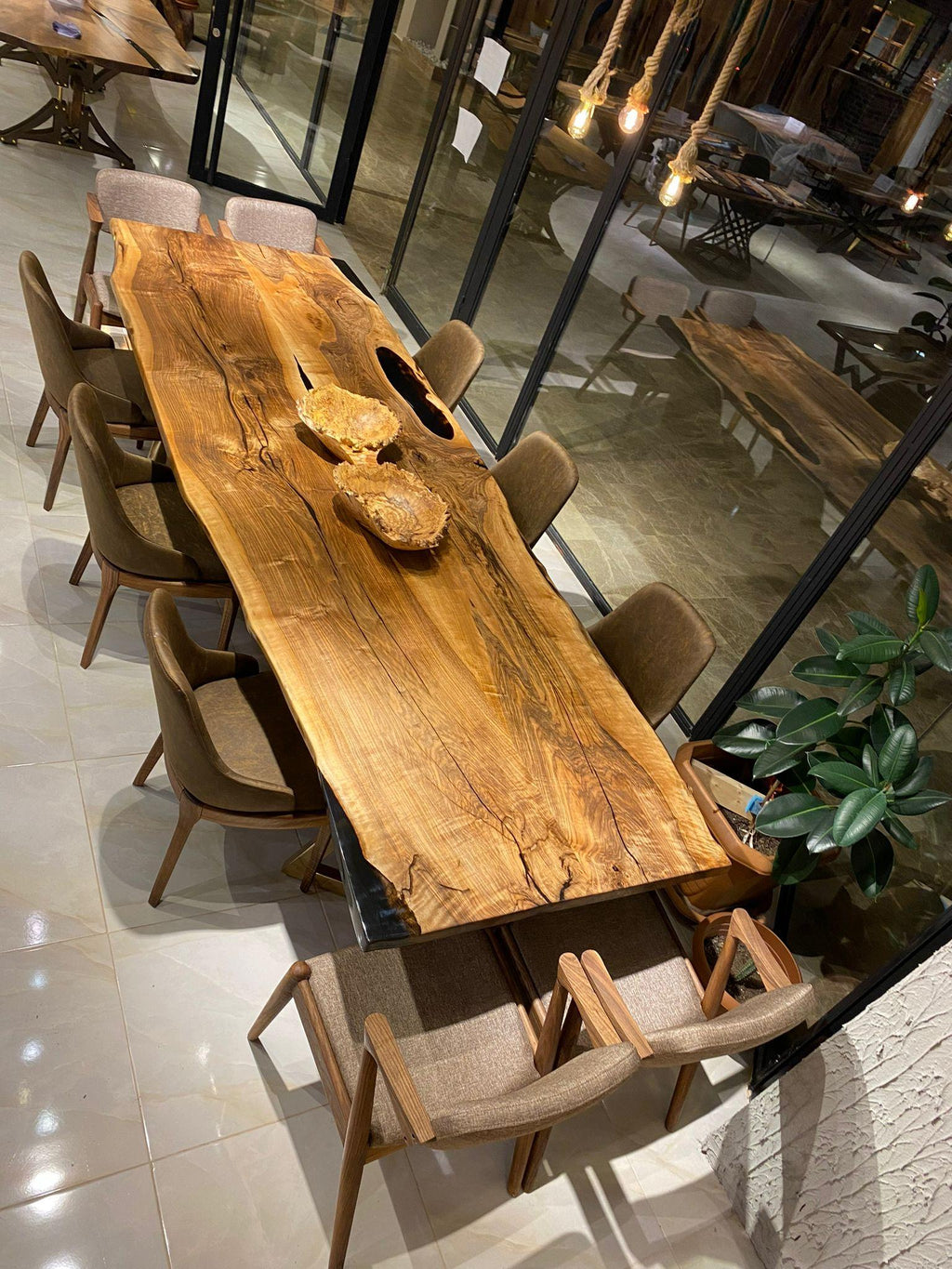 https://a.1stdibscdn.com/custom-black-walnut-epoxy-resin-wooden-natural-custom-kitchen-dining-table-for-sale-picture-3/f_91932/f_453975521749559973451/WhatsApp_Image_2023_02_03_at_17_01_32_master.jpeg