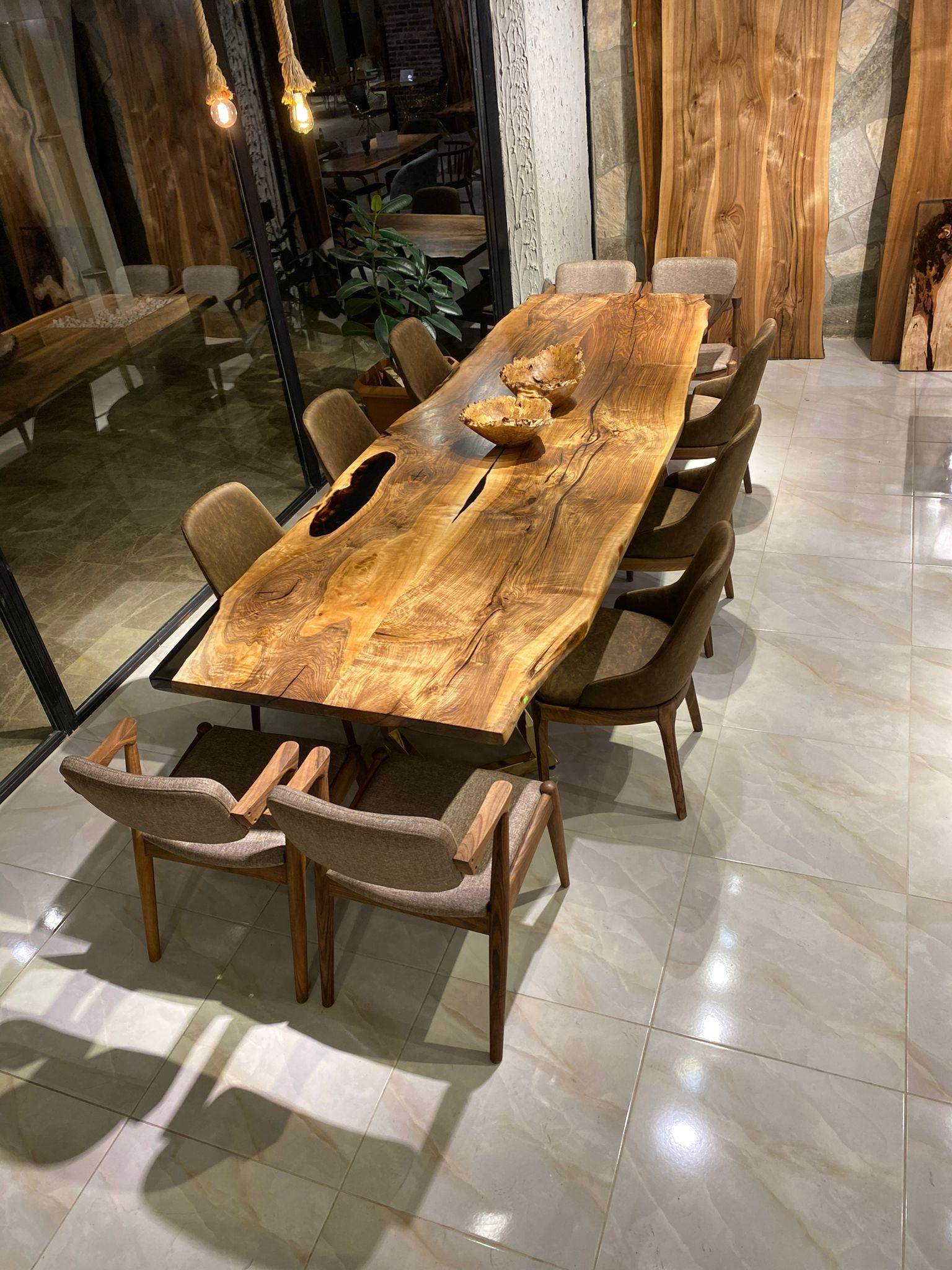 https://a.1stdibscdn.com/custom-black-walnut-epoxy-resin-wooden-natural-custom-kitchen-dining-table-for-sale-picture-5/f_91932/f_453975521749559974740/WhatsApp_Image_2023_02_03_at_17_01_33_master.jpeg