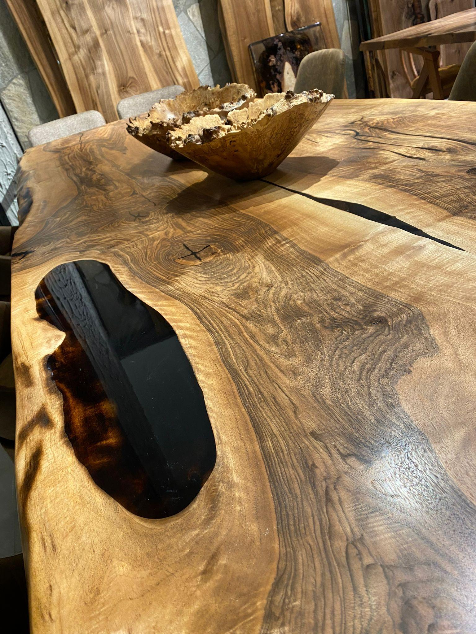 https://a.1stdibscdn.com/custom-black-walnut-epoxy-resin-wooden-natural-custom-kitchen-dining-table-for-sale-picture-4/f_91932/f_453975521749559974107/WhatsApp_Image_2023_02_03_at_17_01_36_1__master.jpeg