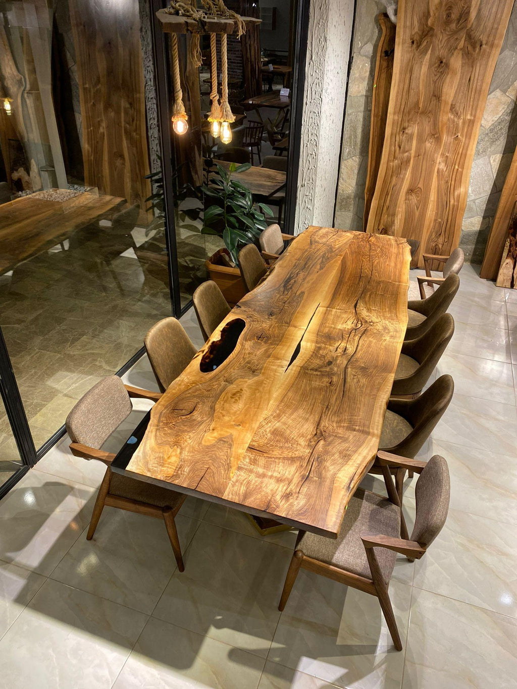 https://a.1stdibscdn.com/custom-black-walnut-epoxy-resin-wooden-natural-custom-kitchen-dining-table-for-sale-picture-8/f_91932/f_453975521749559976293/WhatsApp_Image_2023_02_03_at_17_01_37_1__master.jpeg